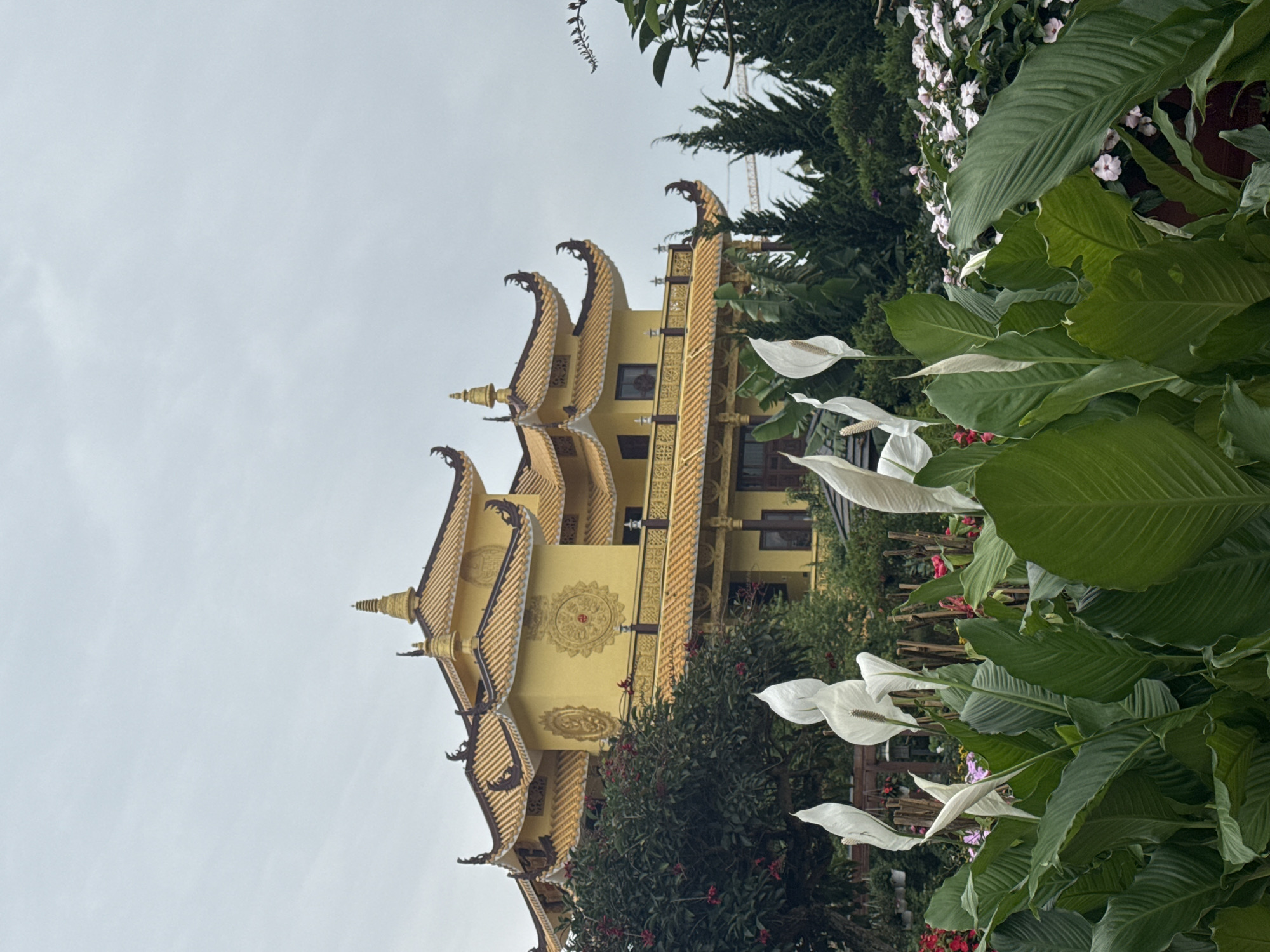Golden temple with traditional architecture observed in Da Lat