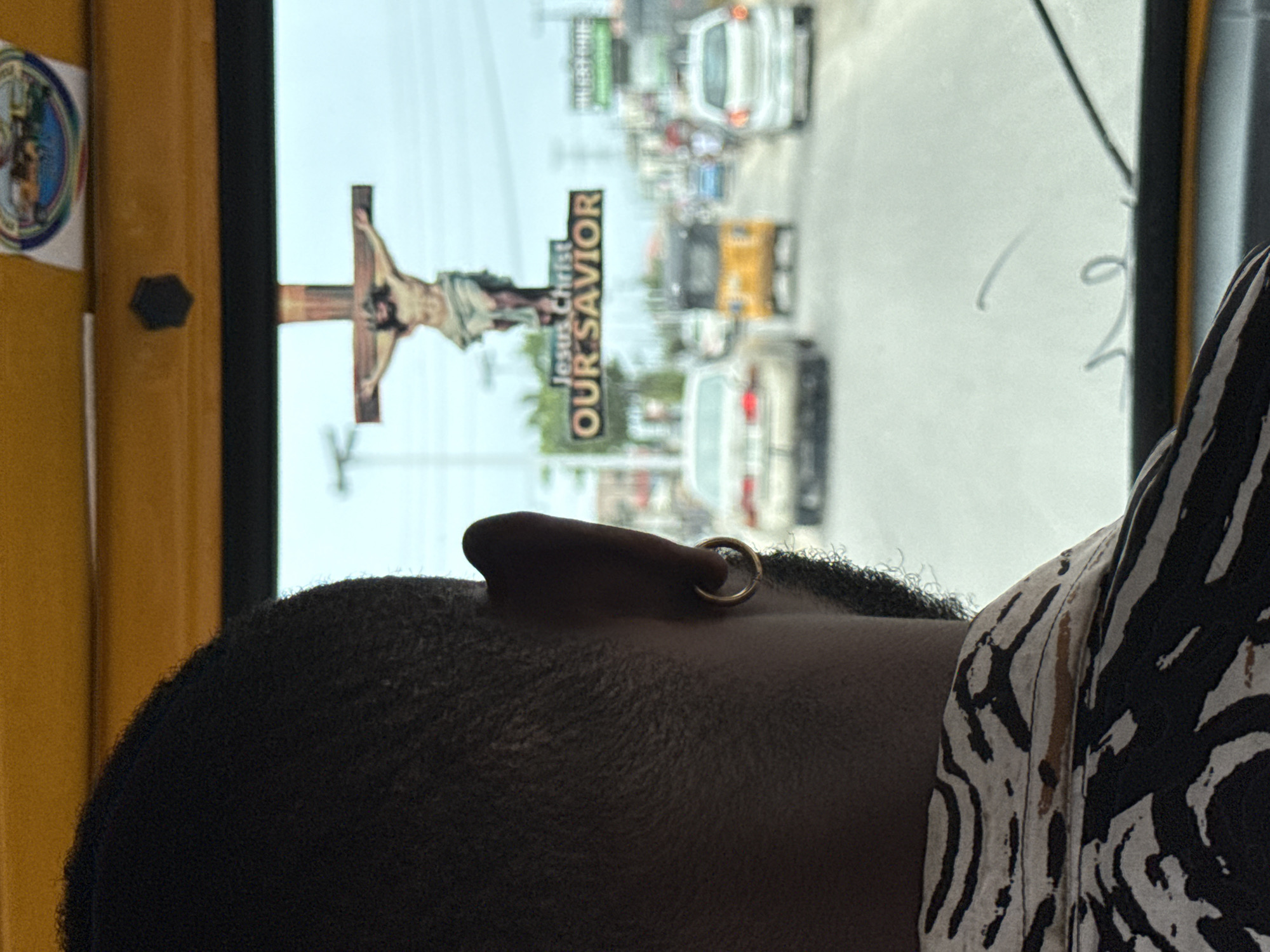 Portrait captured in Ado, Nigeria showing person with gold earring
