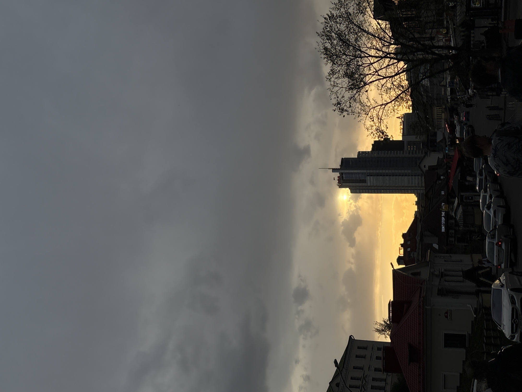 Sunset illuminates Minsk skyline with dramatic cloud contrast