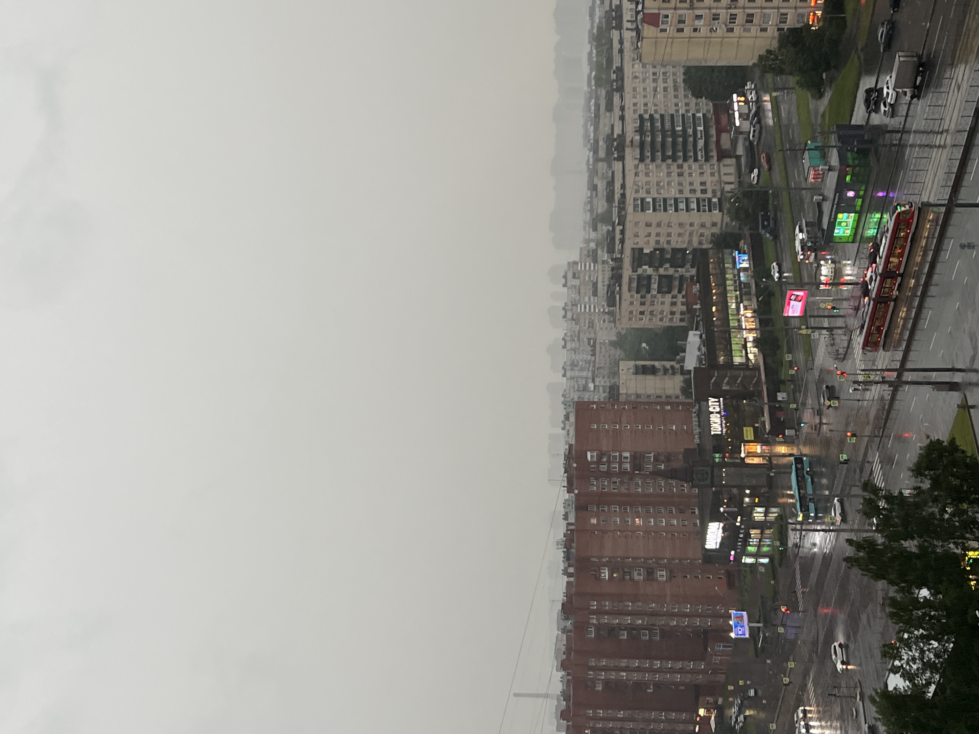 Rainy afternoon over a dense Soviet-era Russian cityscape
