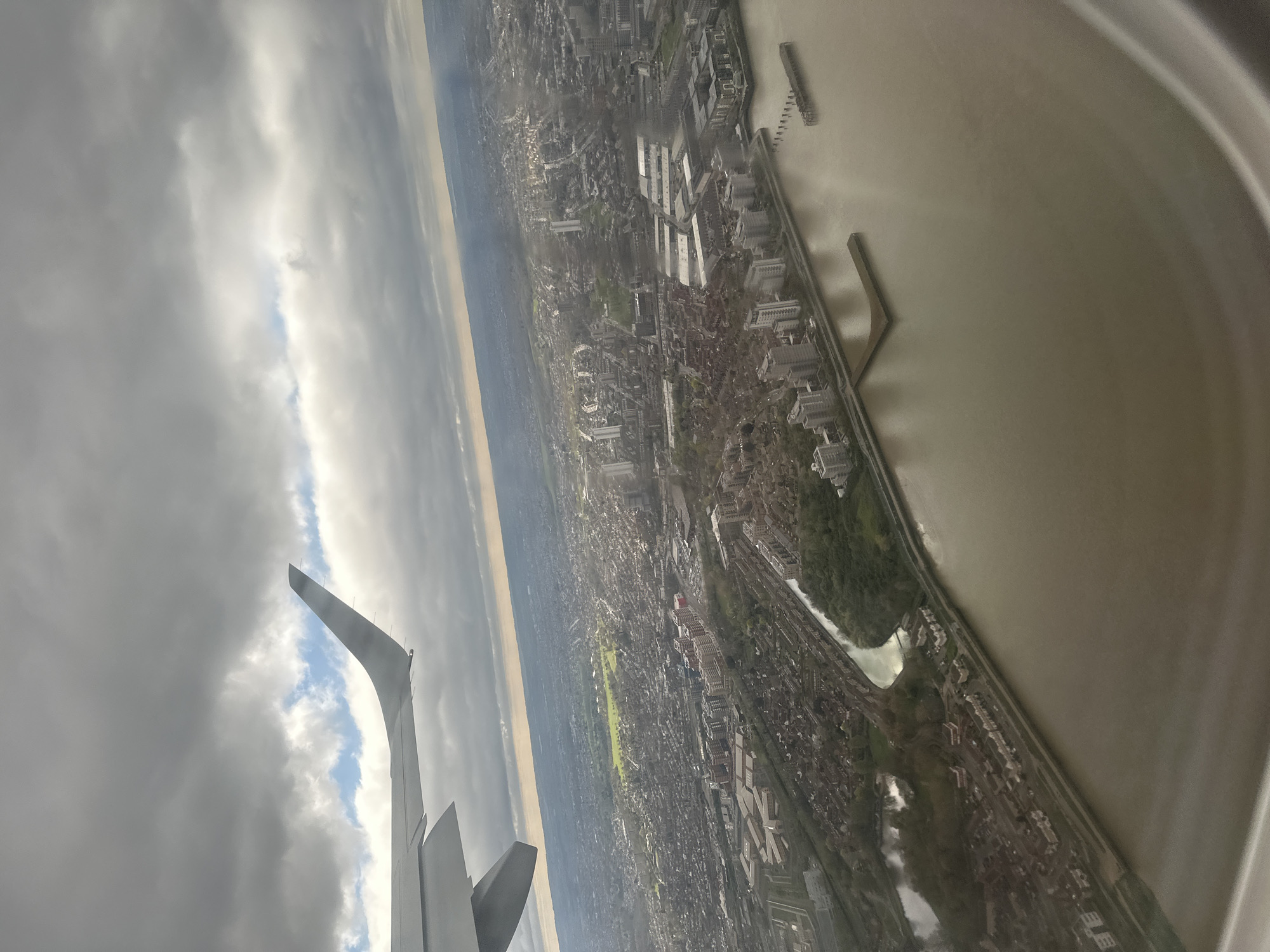 Aerial view of London Thames captured from airplane window