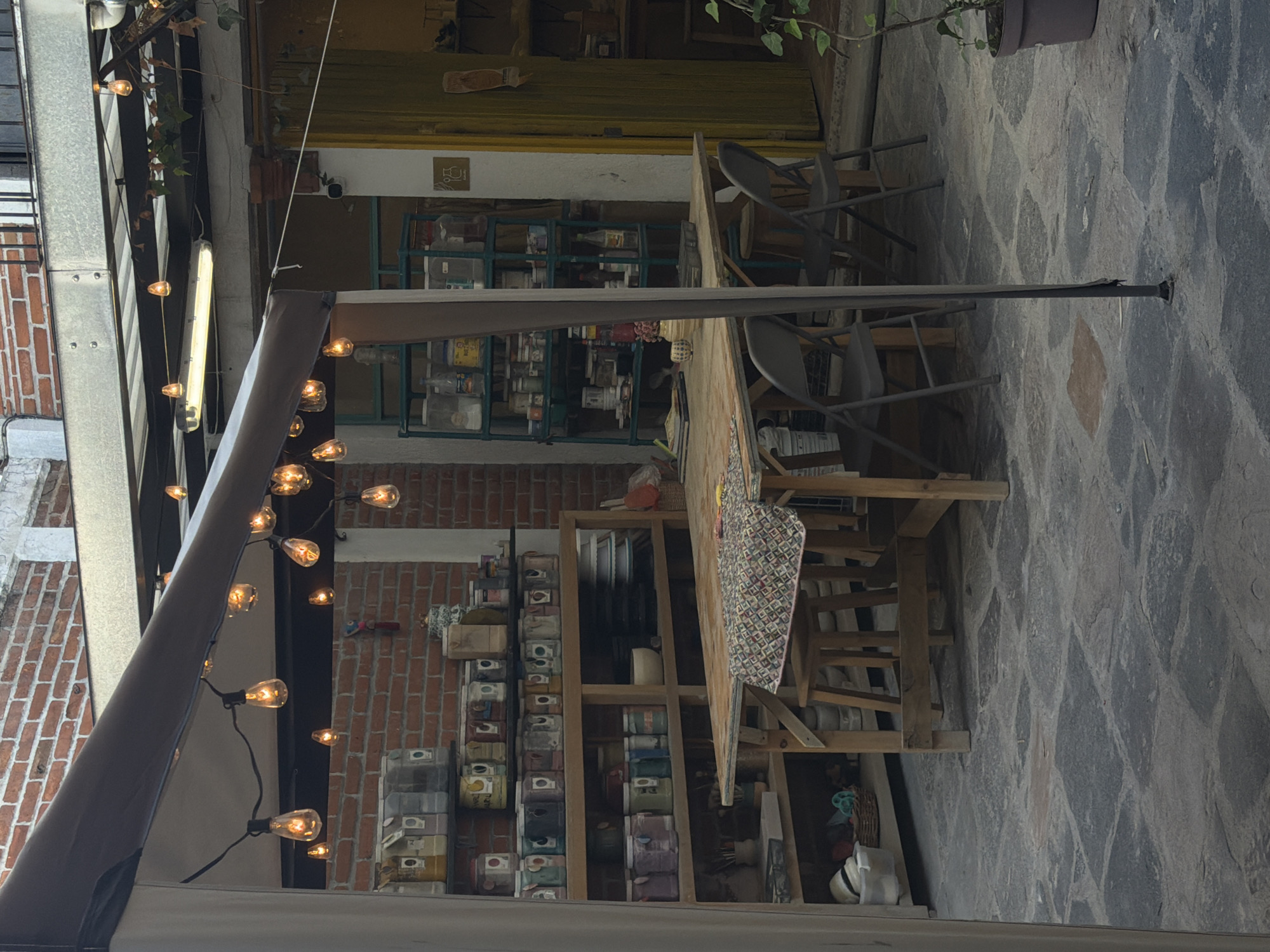 Ceramic artwork documented in outdoor workshop space