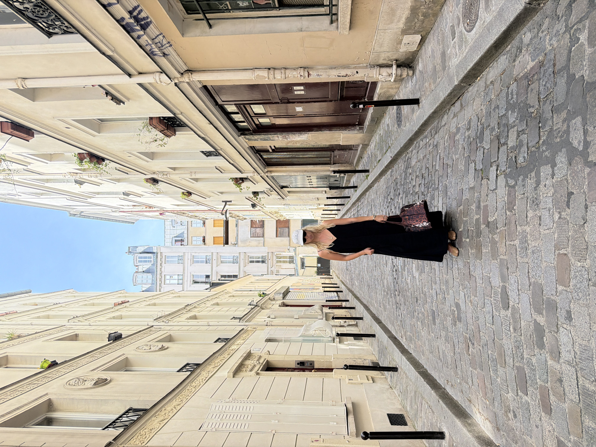 A sunny afternoon wandering cobblestone Paris near Montmartre