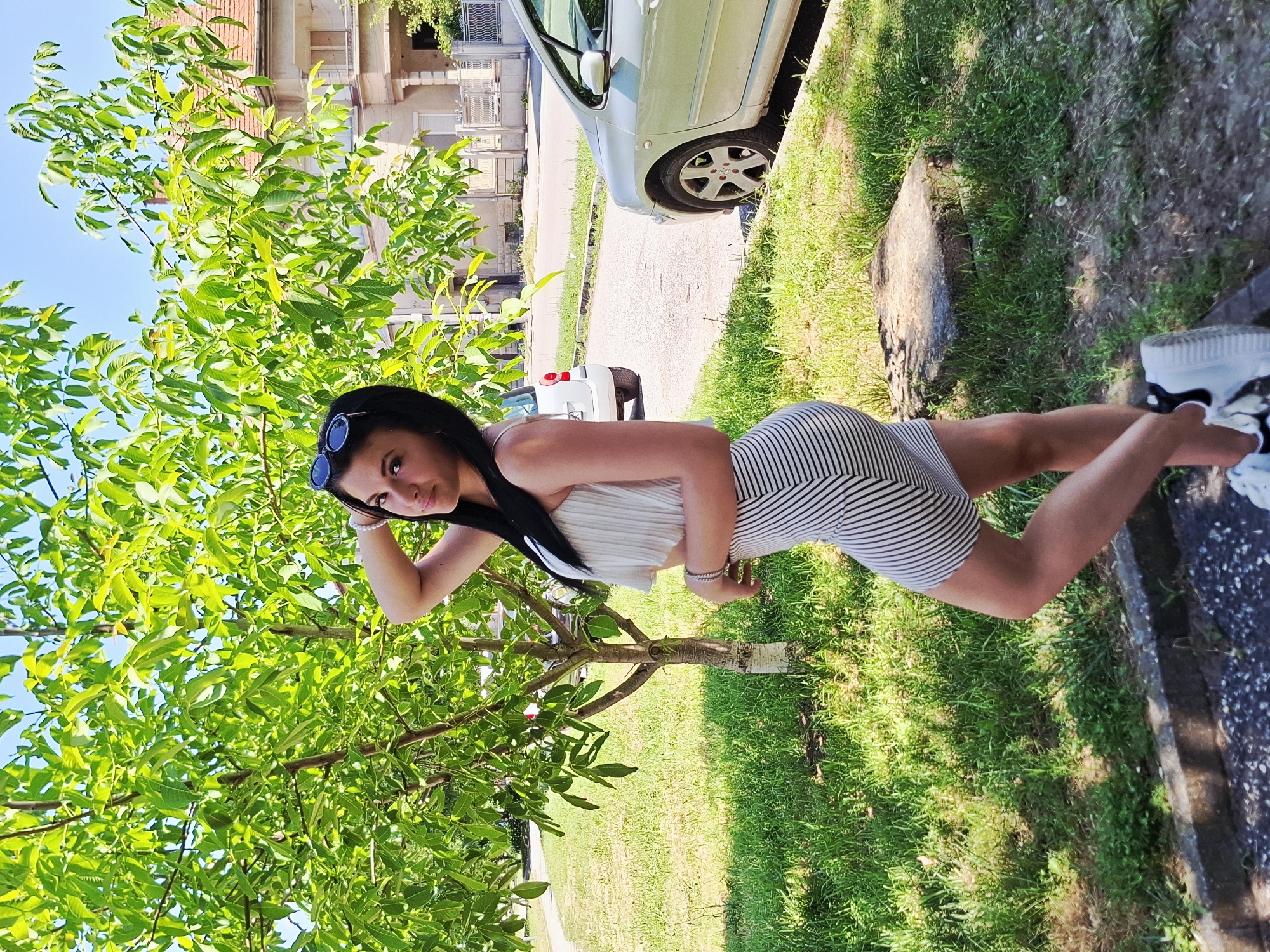 Woman poses for photos amid oak trees in Mezdra