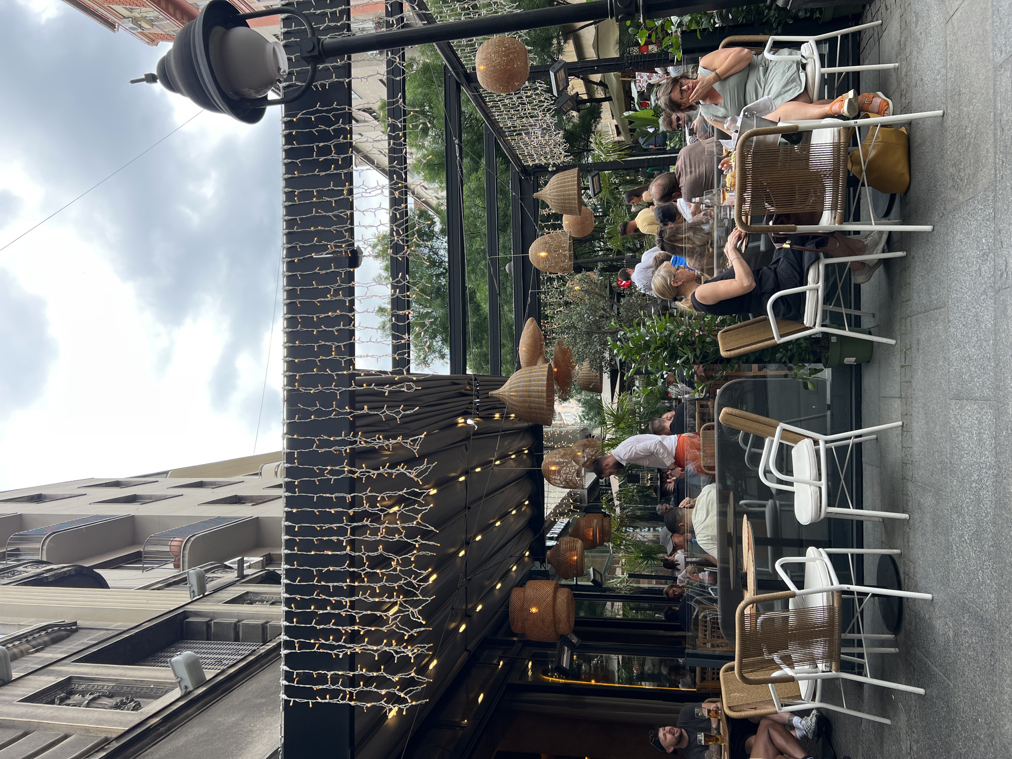 Outdoor cafe dining captured in Belgrade during afternoon hours