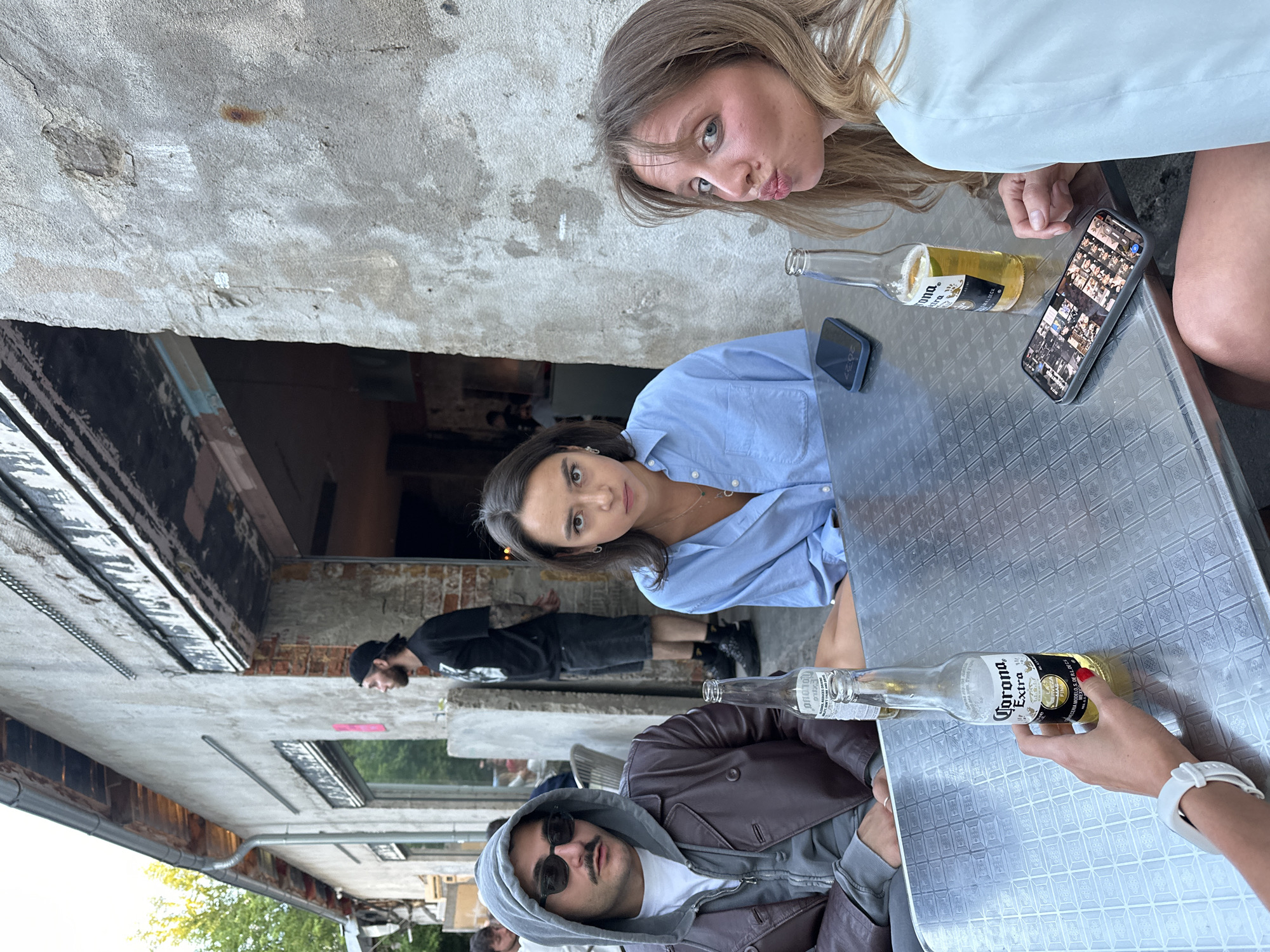 Casual evening out in Moscow, pizza and beers near a historic church