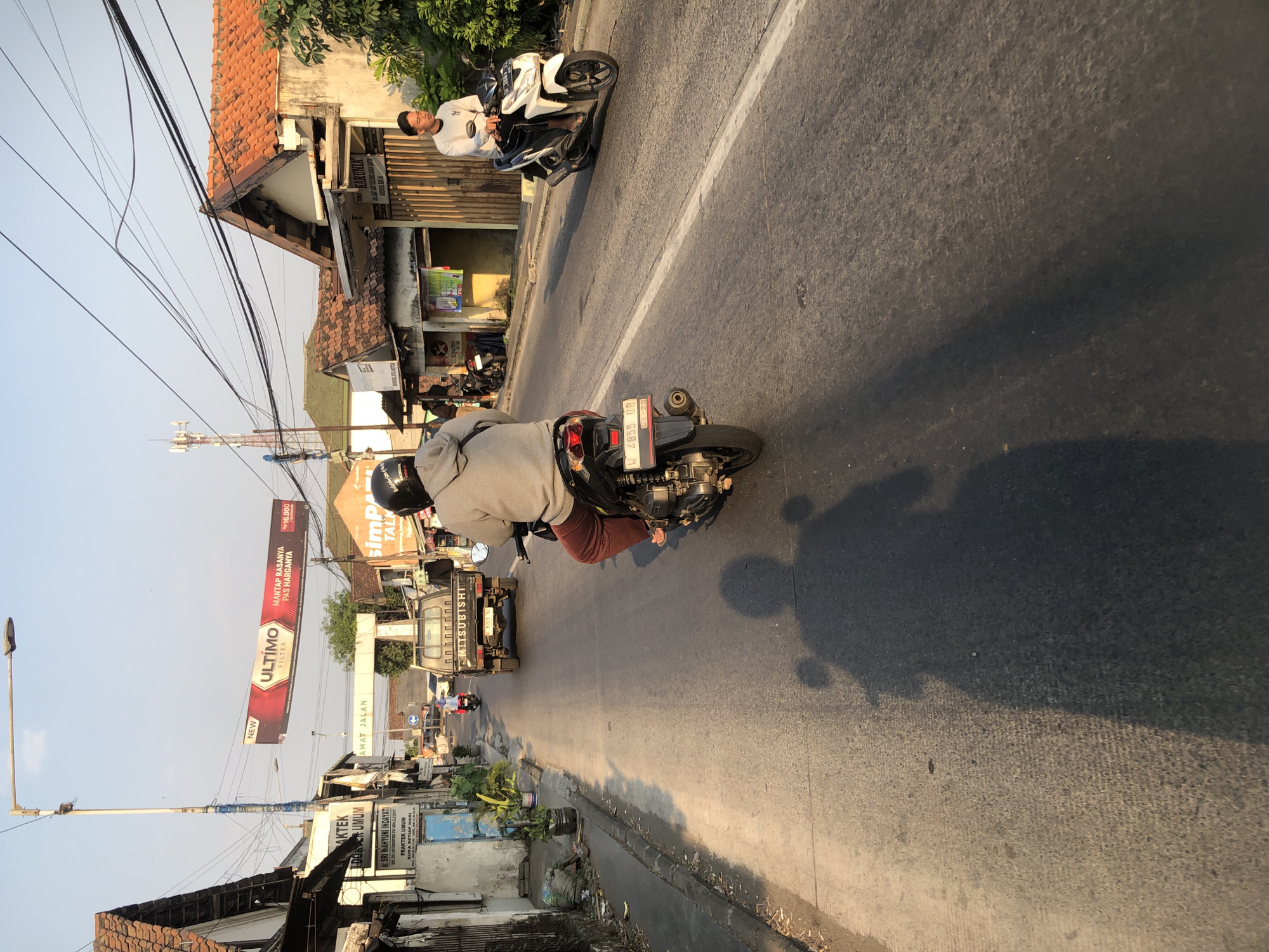 Busy morning traffic flows through Kludan and Boro, East Java
