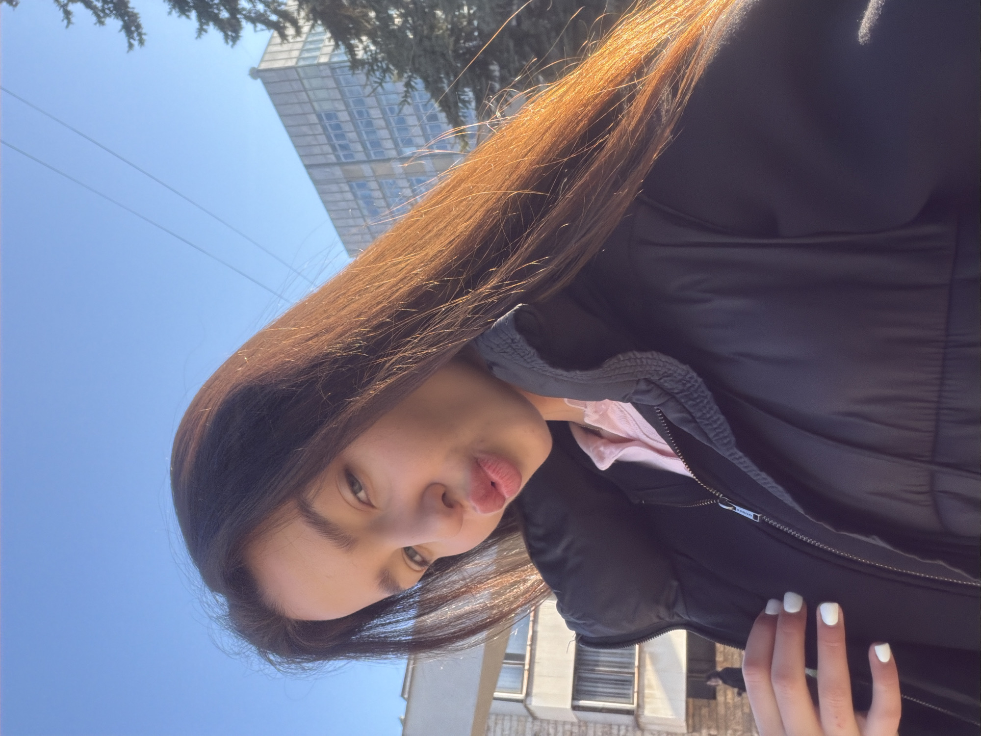 Woman photographed in multiple selfies around Pernik, Bulgaria