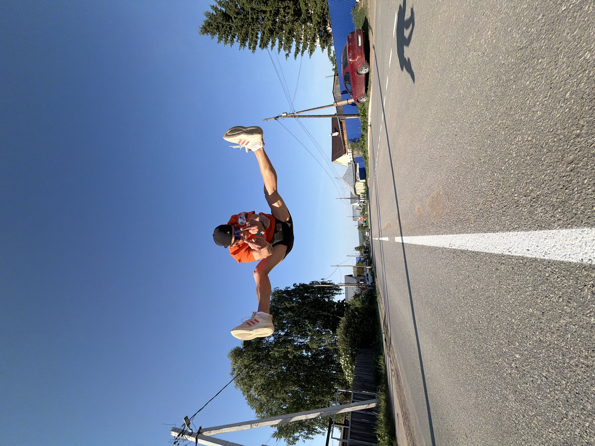 Man performs aerial split jump on Chaikovsky street