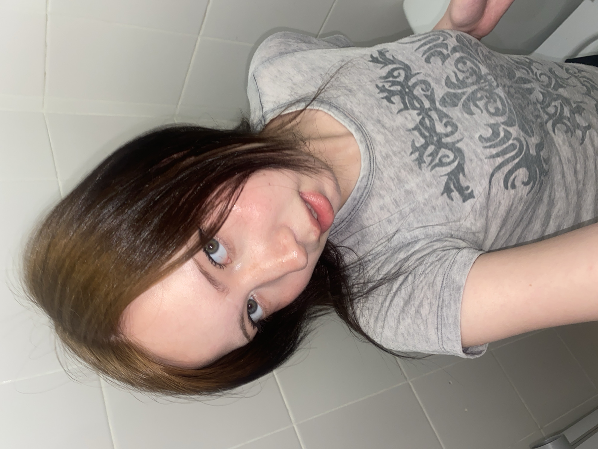 Portrait photos capture person in gray shirt Friday morning