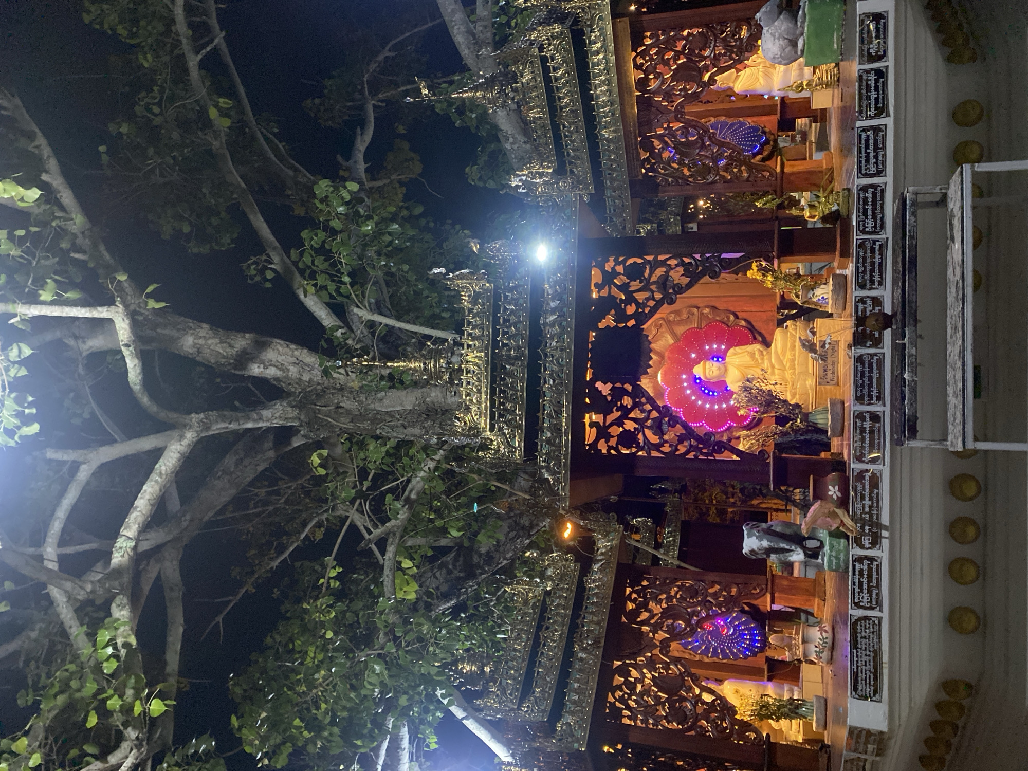 Buddhist temple complex documented at night in Thailand