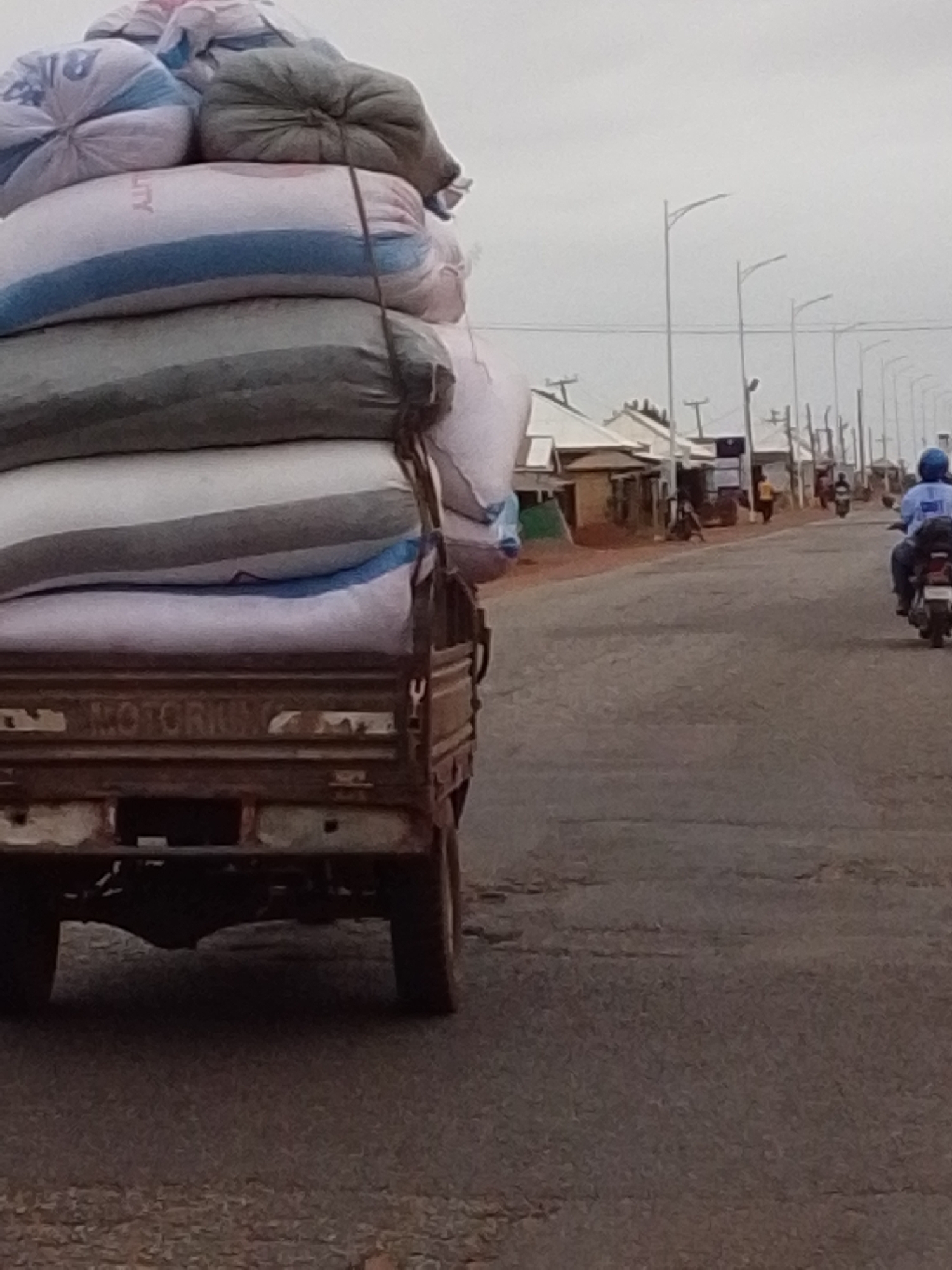 Overloaded truck observed on road in Dungu, Ghana
