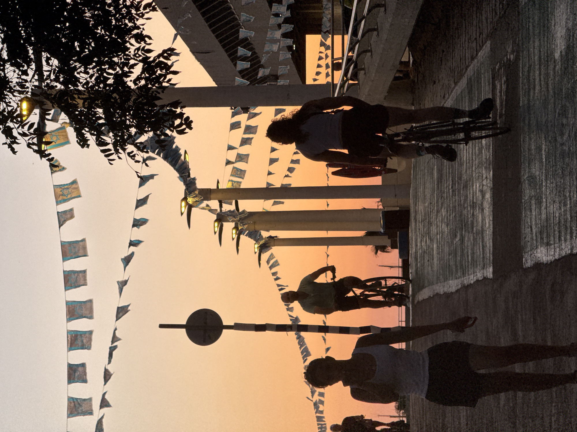 Golden hour along Tel Aviv's promenade and marina