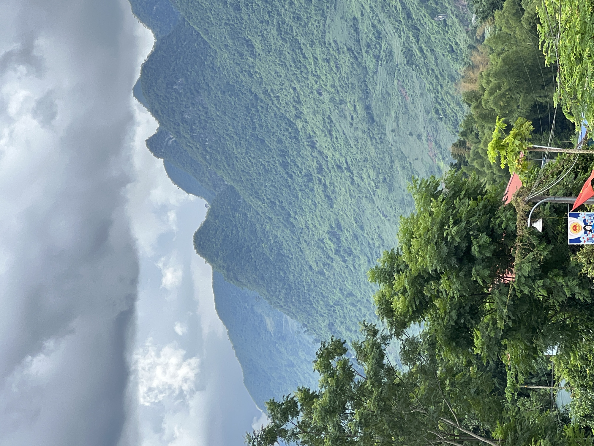Rural mountain scenery along a winding road in Lũng Tám, Vietnam