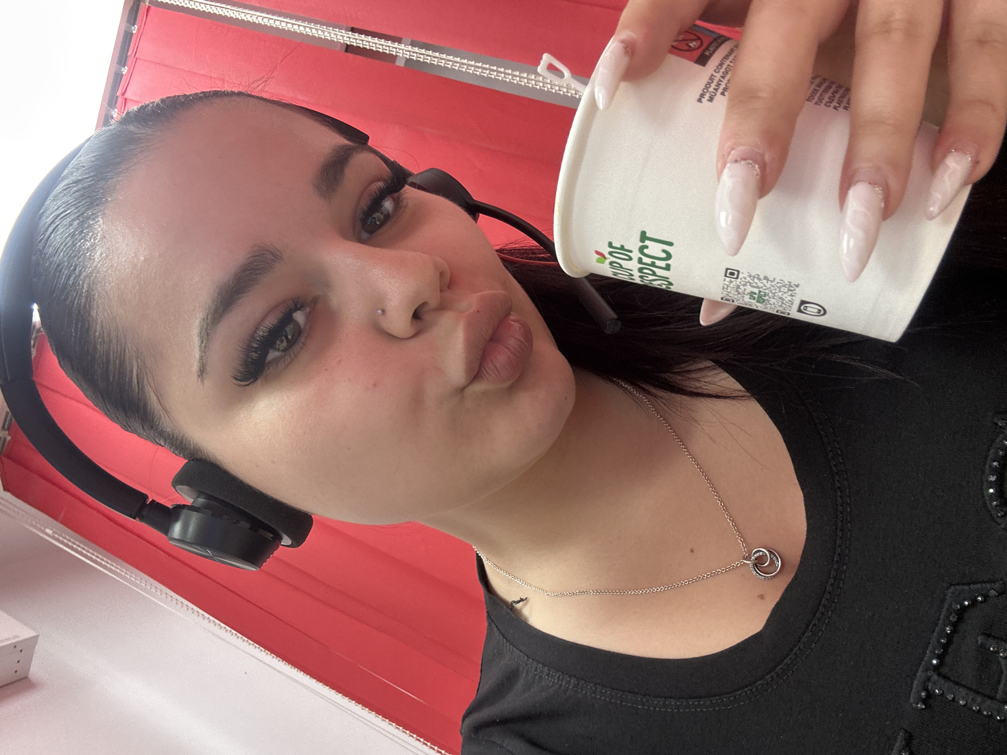 Woman holds 'Cup of Respect' while working in Plovdiv
