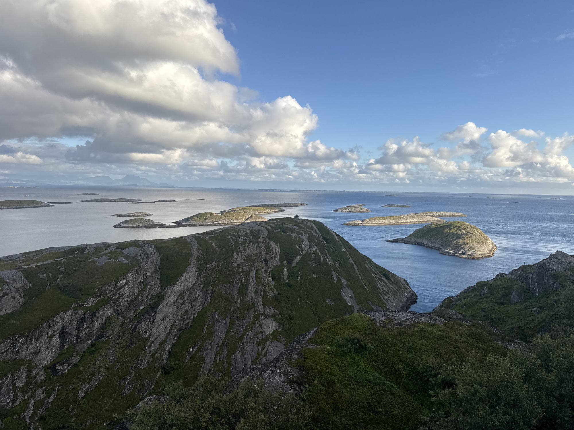 Hiking the rugged cliffs of Lovund with coastal views