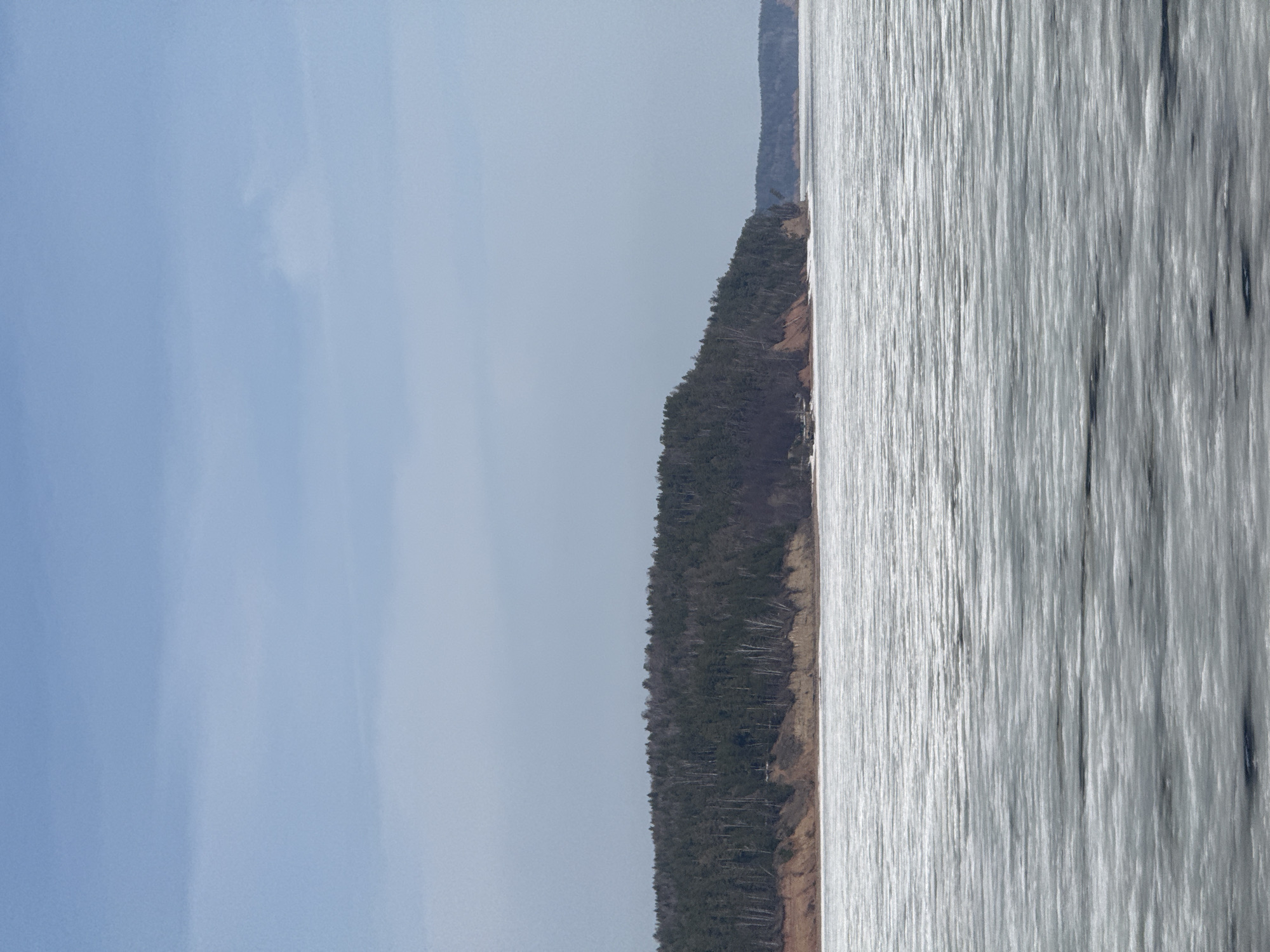 Morning river view captured from vehicle in Chaikovsky, Russia