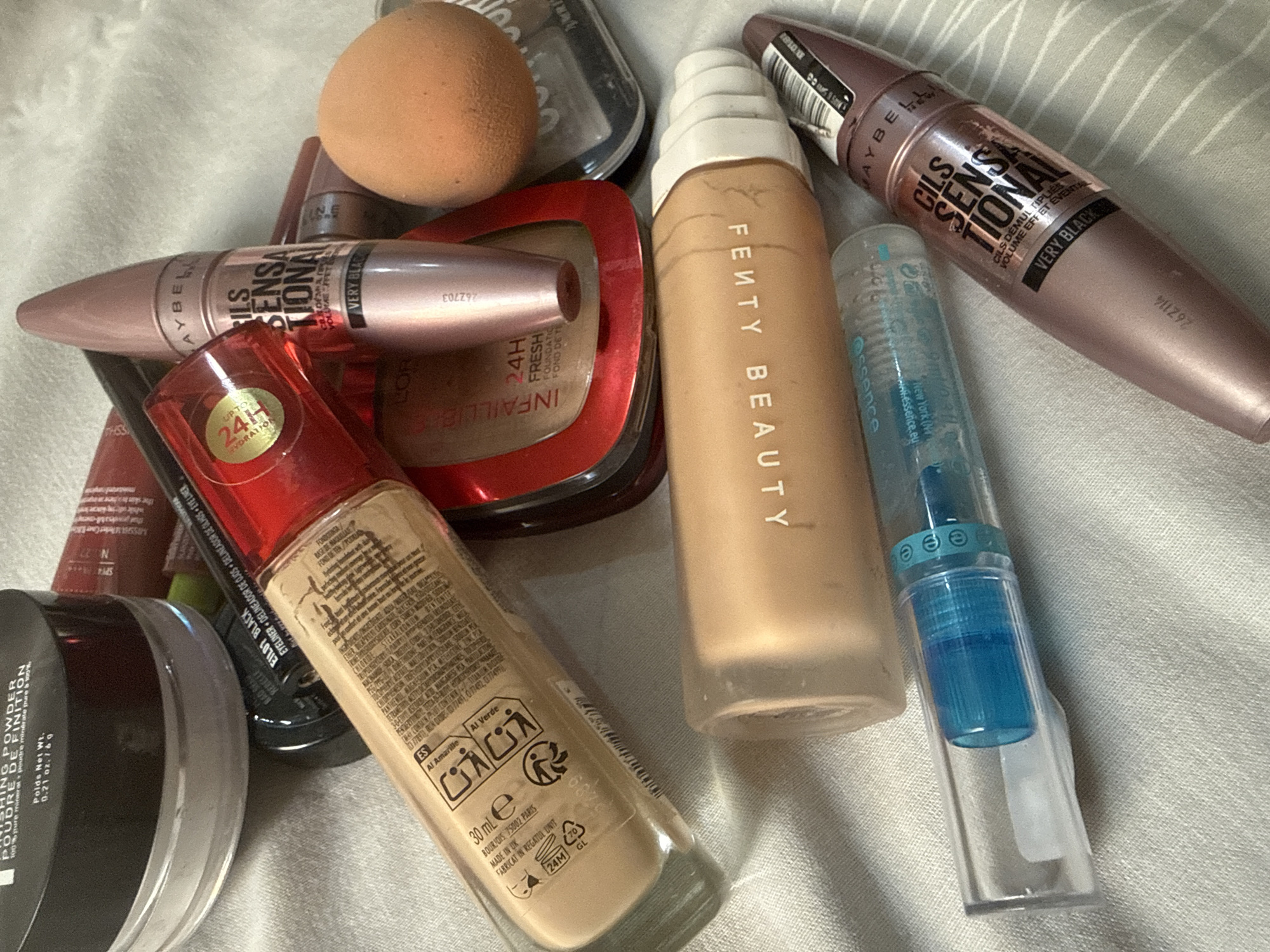 Makeup and skincare tools laid out and unboxed