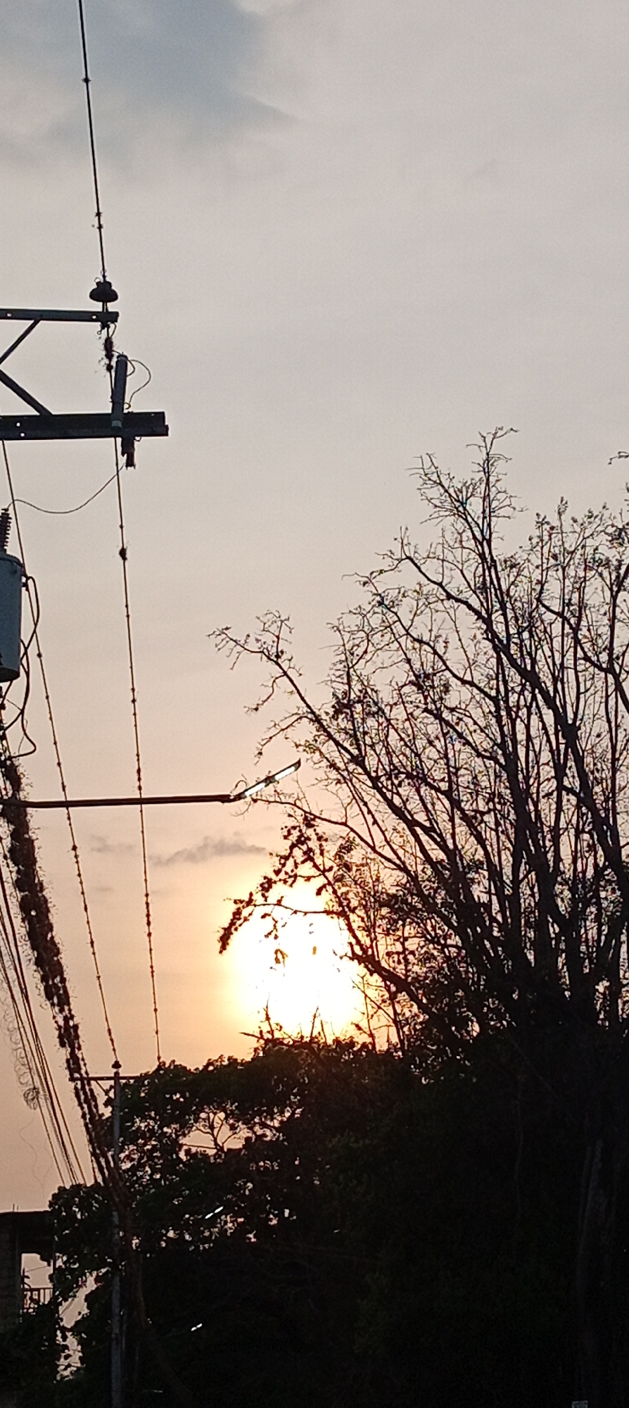 Sunset captured through power lines in Tinaquillo, Venezuela
