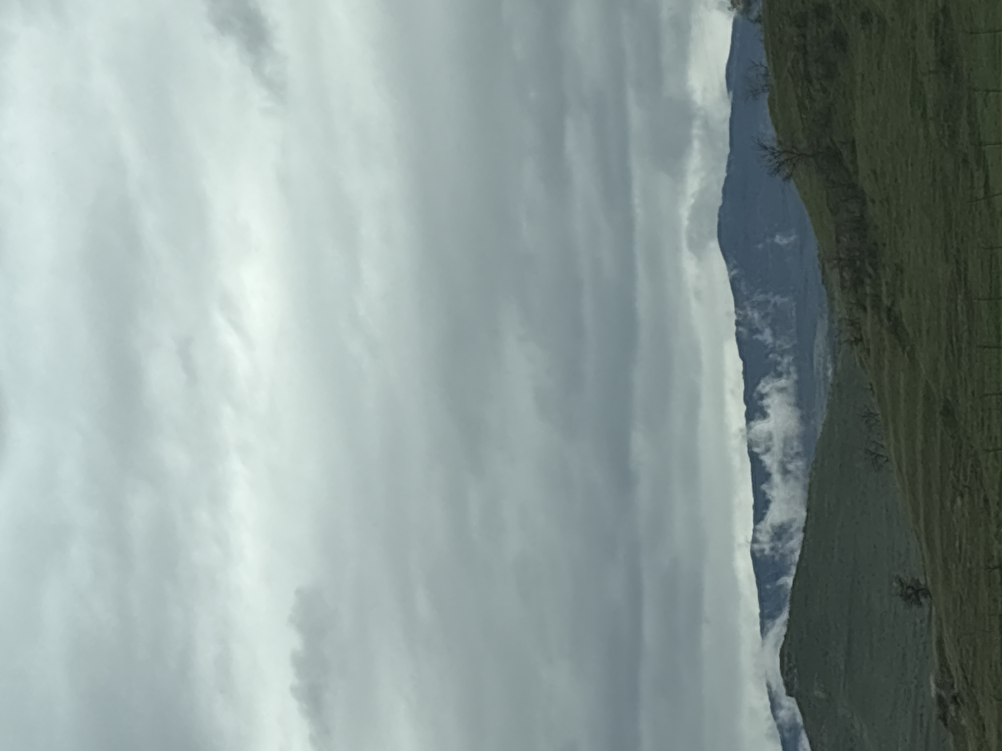 Mountain range viewed through clouds near Levunovo, Bulgaria