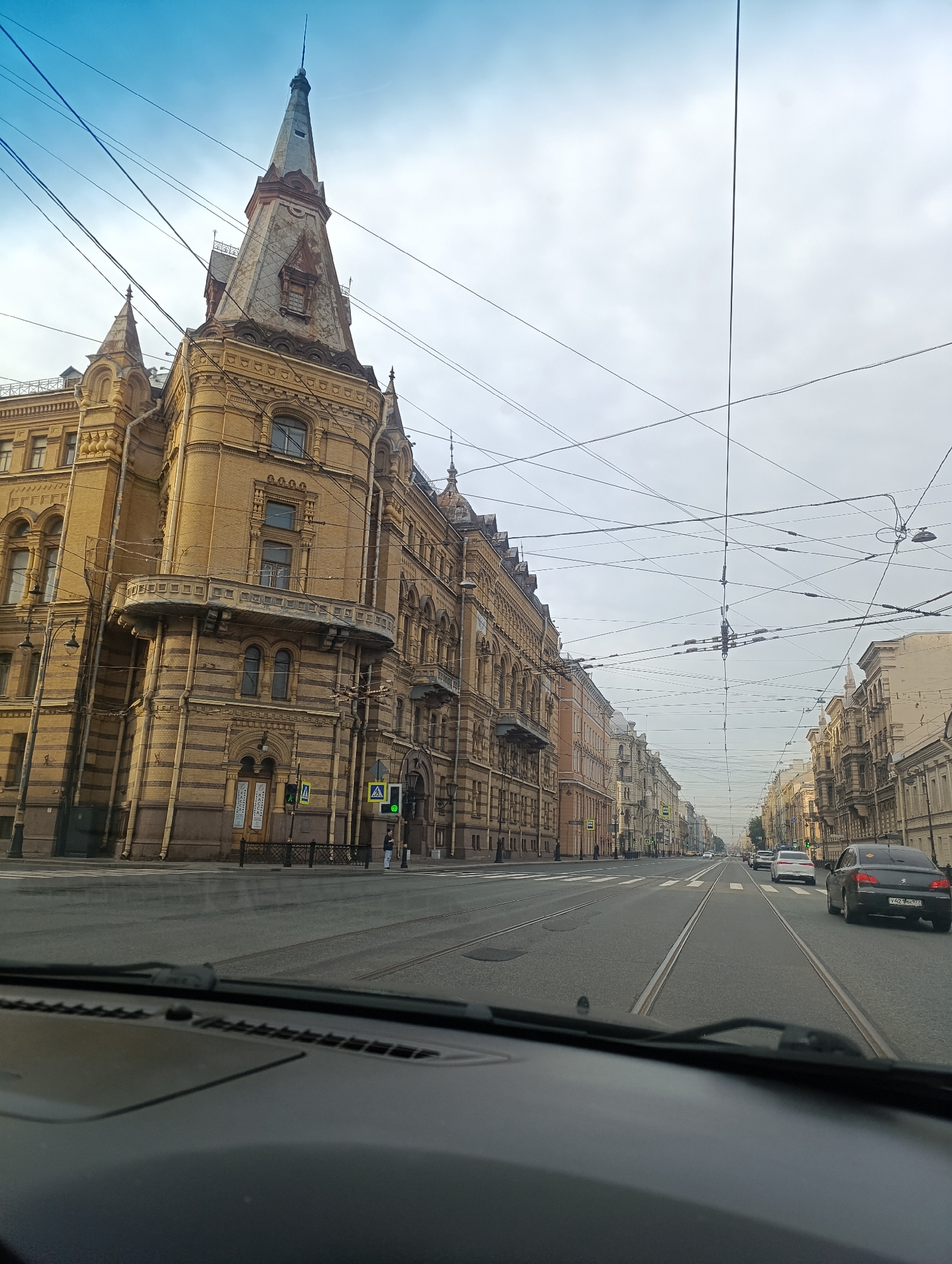 Moving through a grand tram-lined avenue in Saint Petersburg
