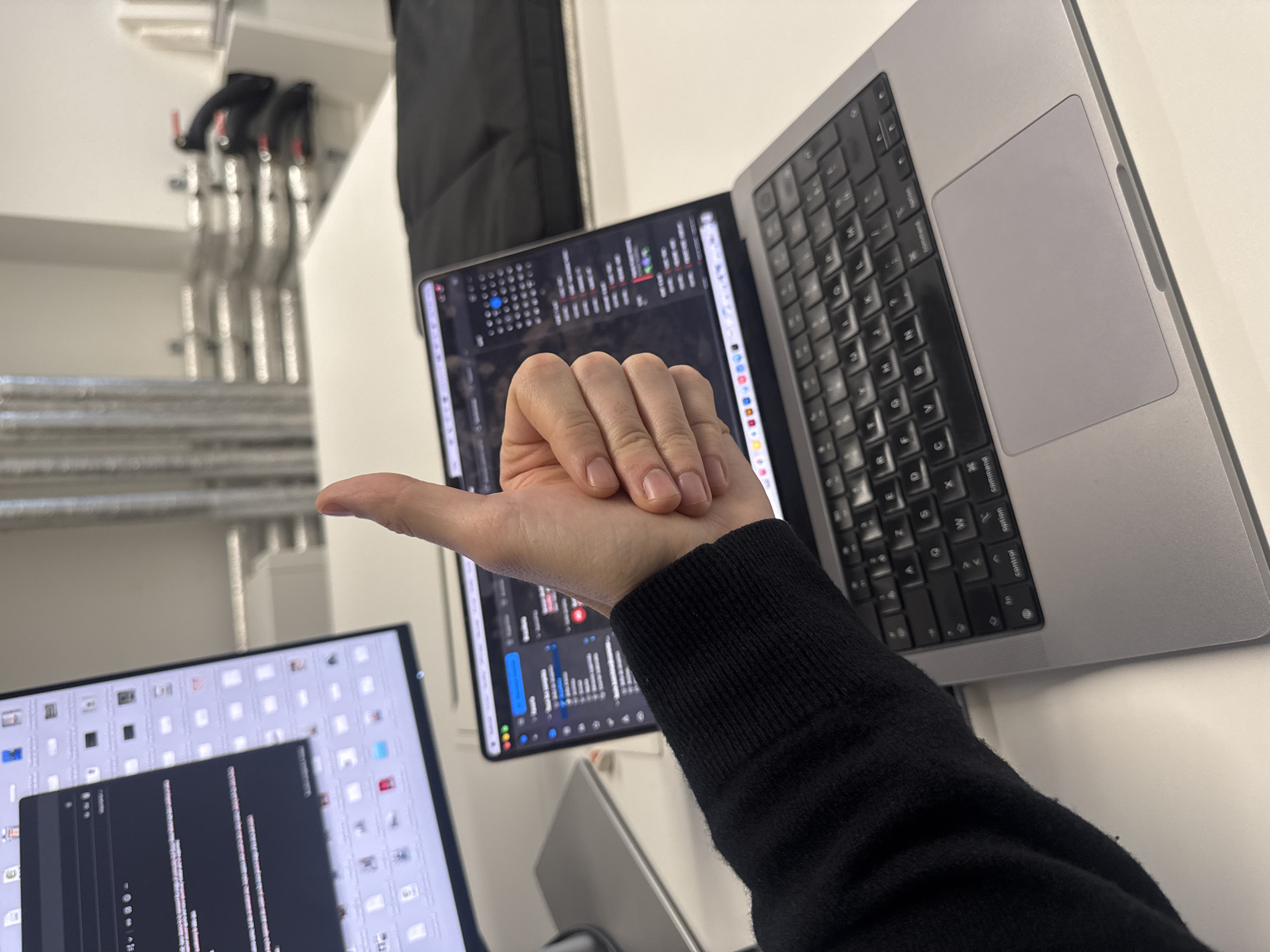 Thumbs up gesture captured at Paris workstation
