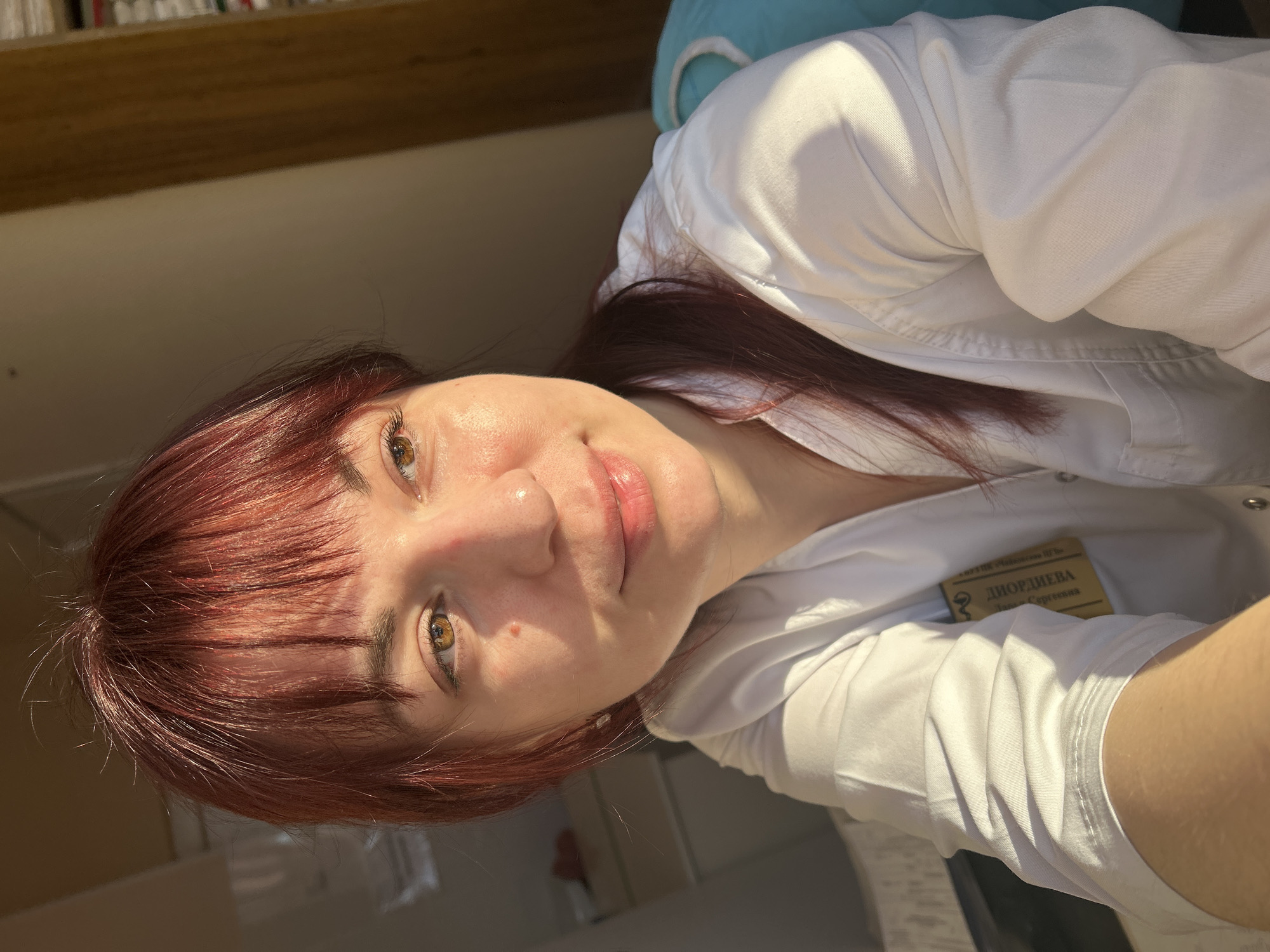 Healthcare worker photographed in lab coat in Фоки, Russia