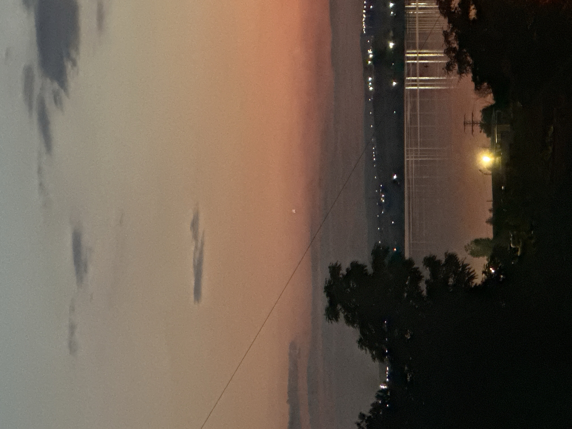 A summer day winds down across Varna, sky to shoreline.