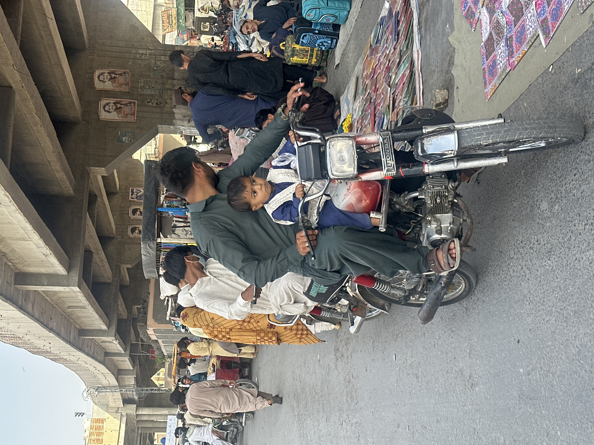 Man with child spotted on motorcycle in Quetta