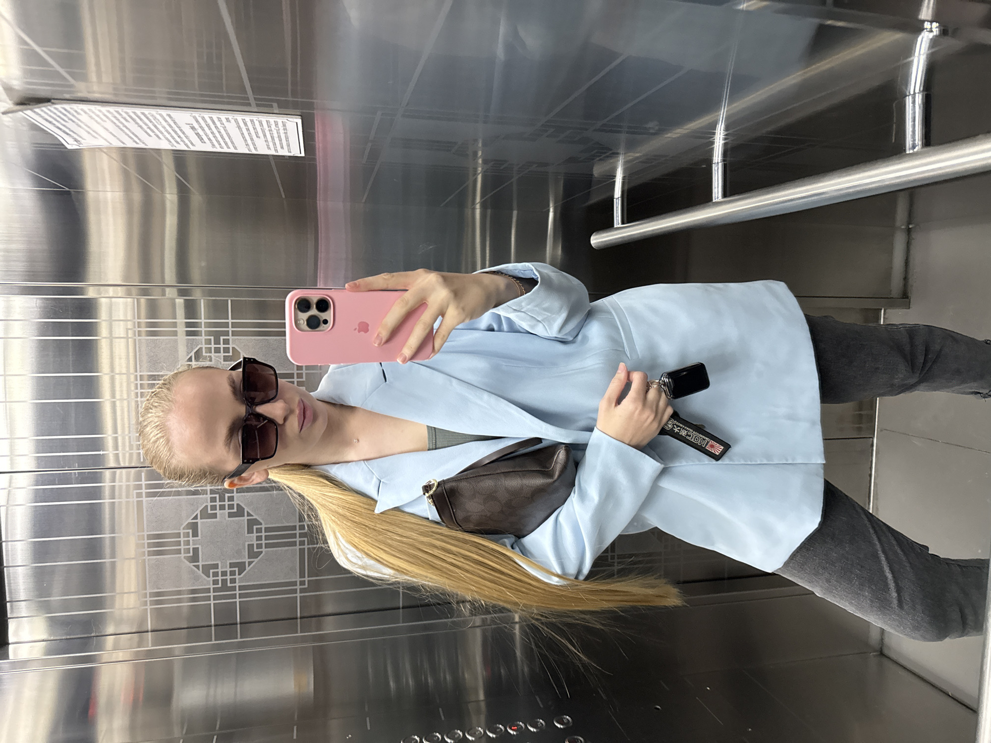 Tourist documents elevator selfies, city views in Petropavlovsk-Kamchatsky