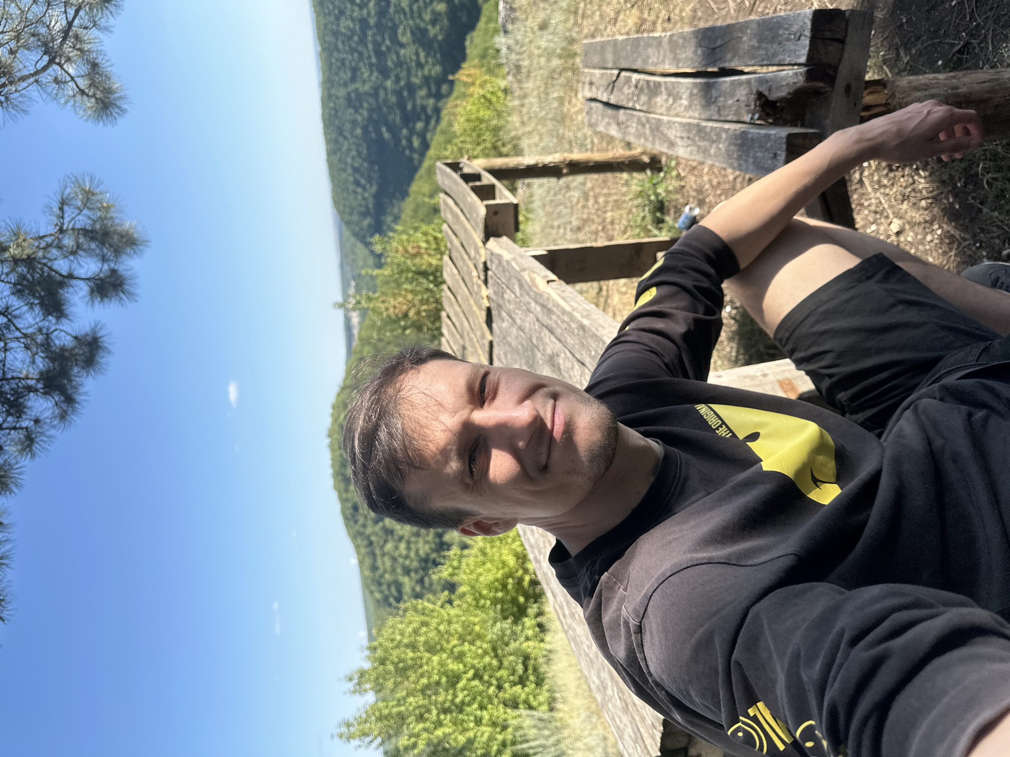Hilltop bench stop with forest views near Humentsi, Ukraine