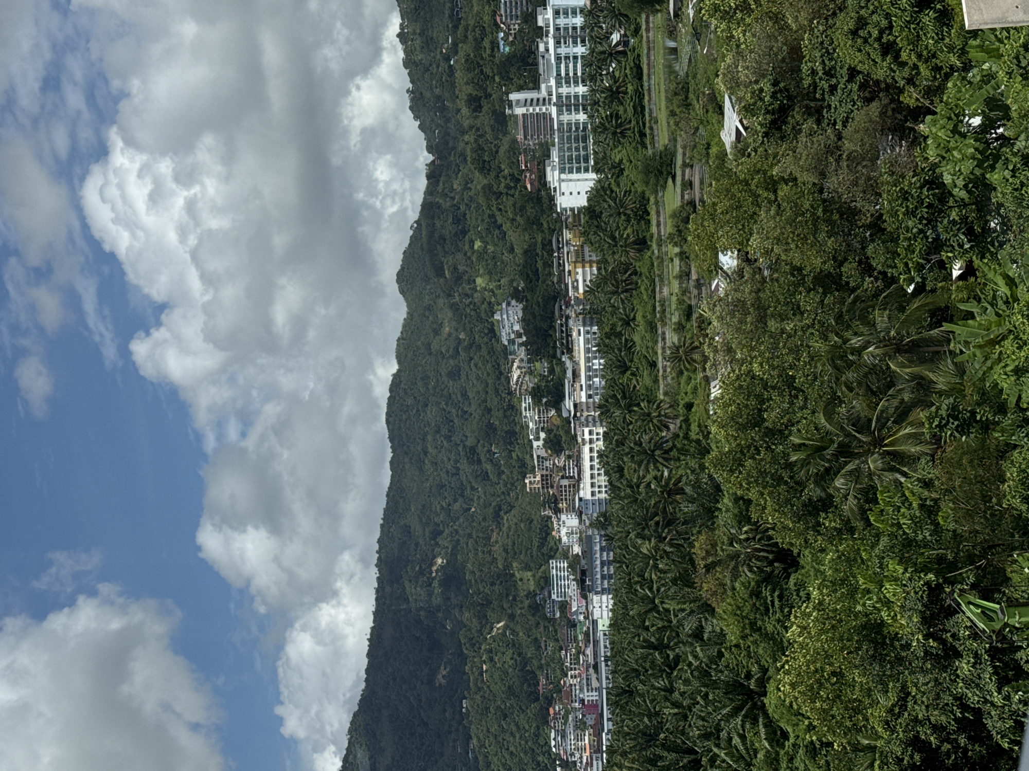 Breakfast views over Patong, with construction dotting the hills below
