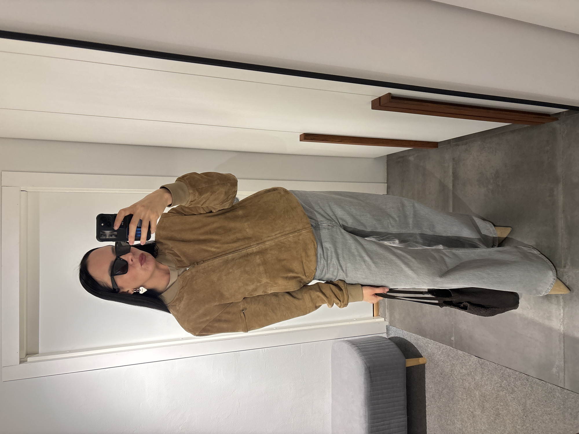 Woman takes selfies in dressing room in Chaikovsky