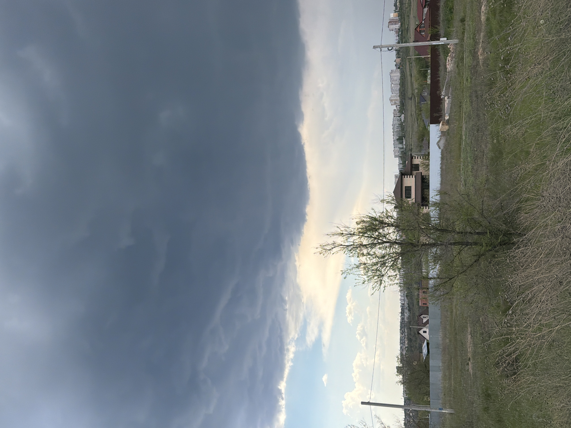 Dramatic storm clouds create stark weather contrast over Kamyshin