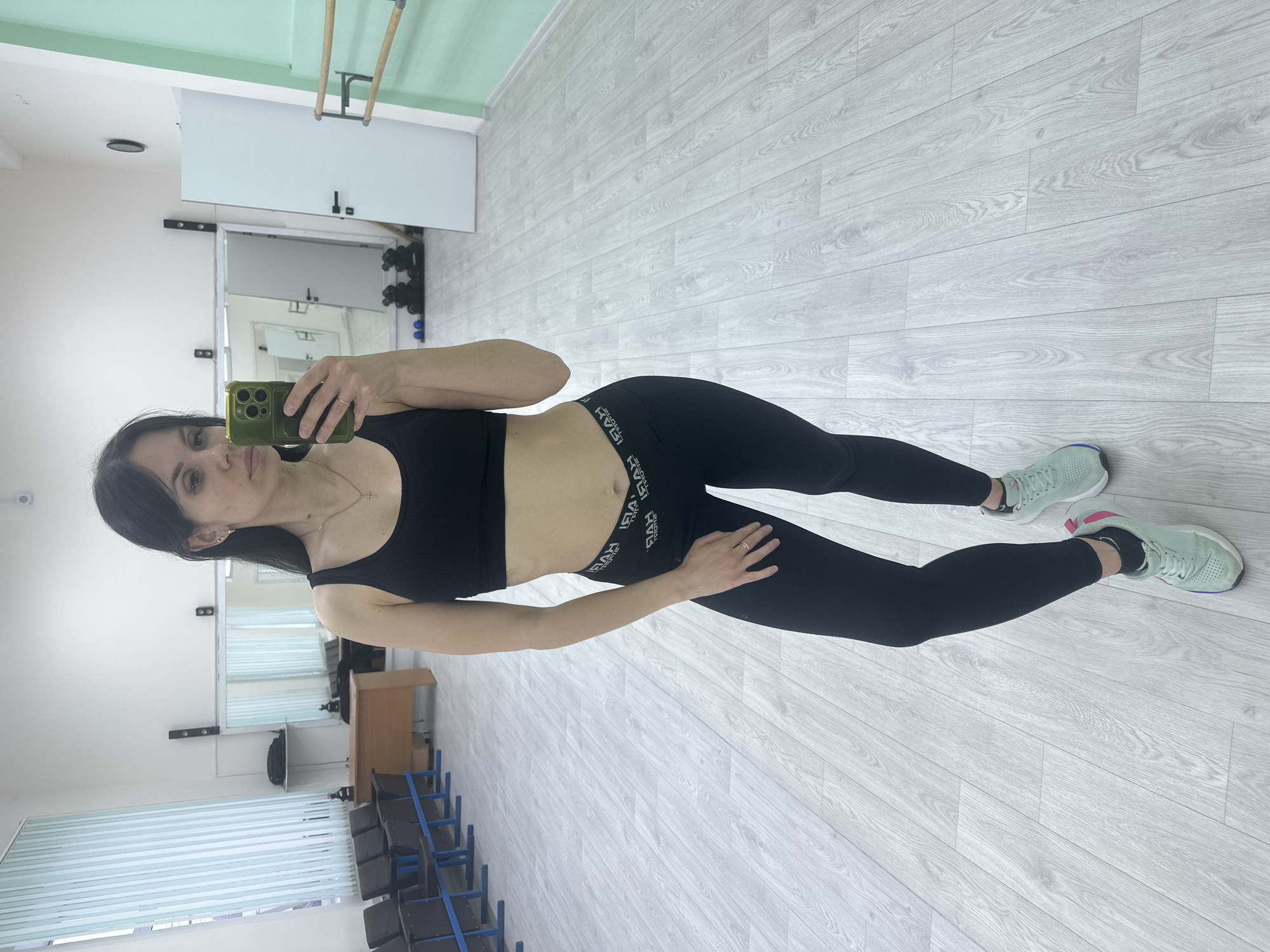 Woman photographed in dance studio during afternoon session