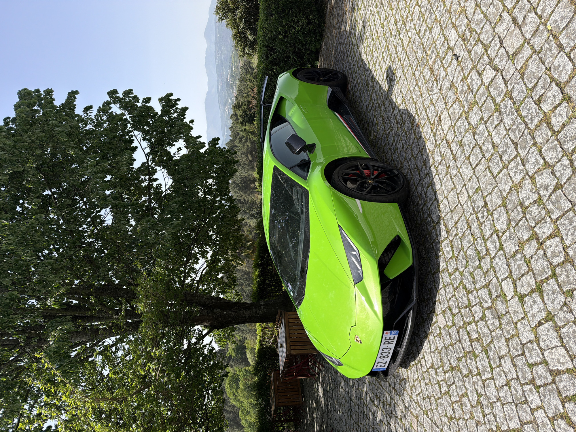 Green Lamborghini spotted on cobblestone streets in Vila Real