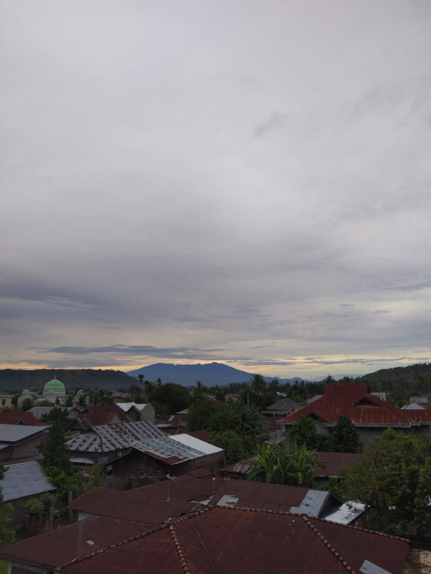Overcast evening over Bireuenmeunasahdayah residential district captured aerially