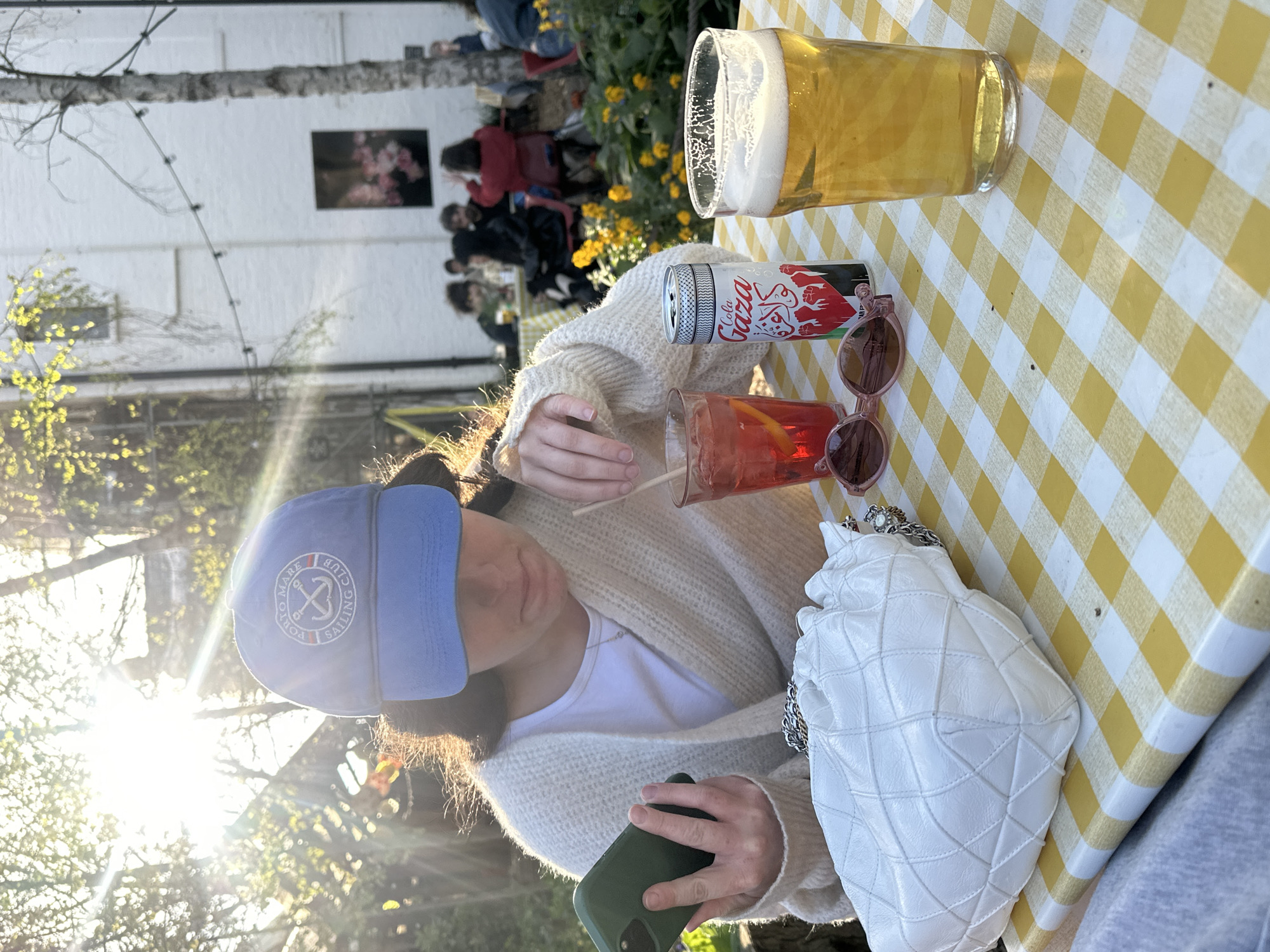 Woman enjoys afternoon break in London garden setting