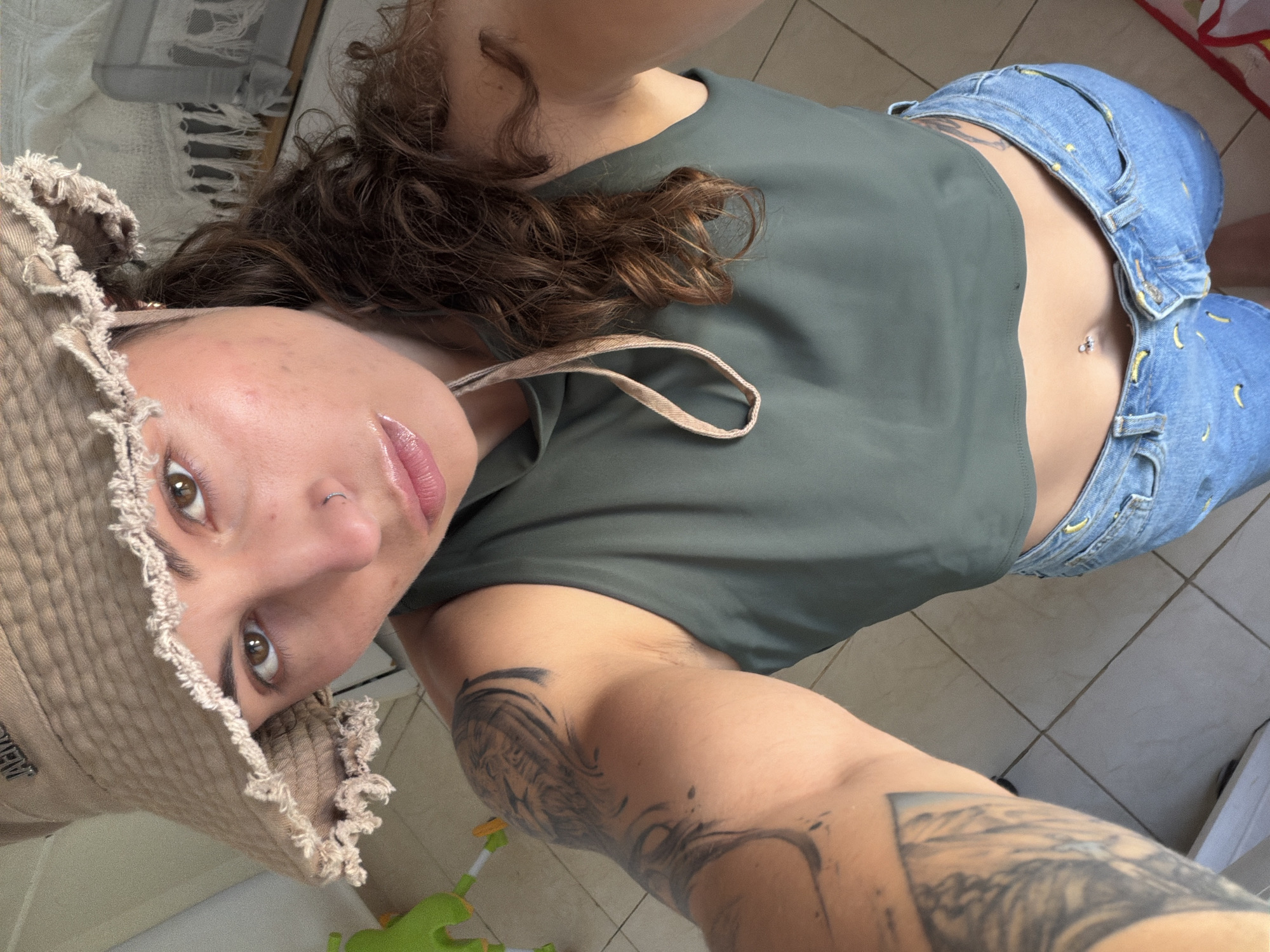 Woman takes morning selfies in Kiryat Bialik apartment