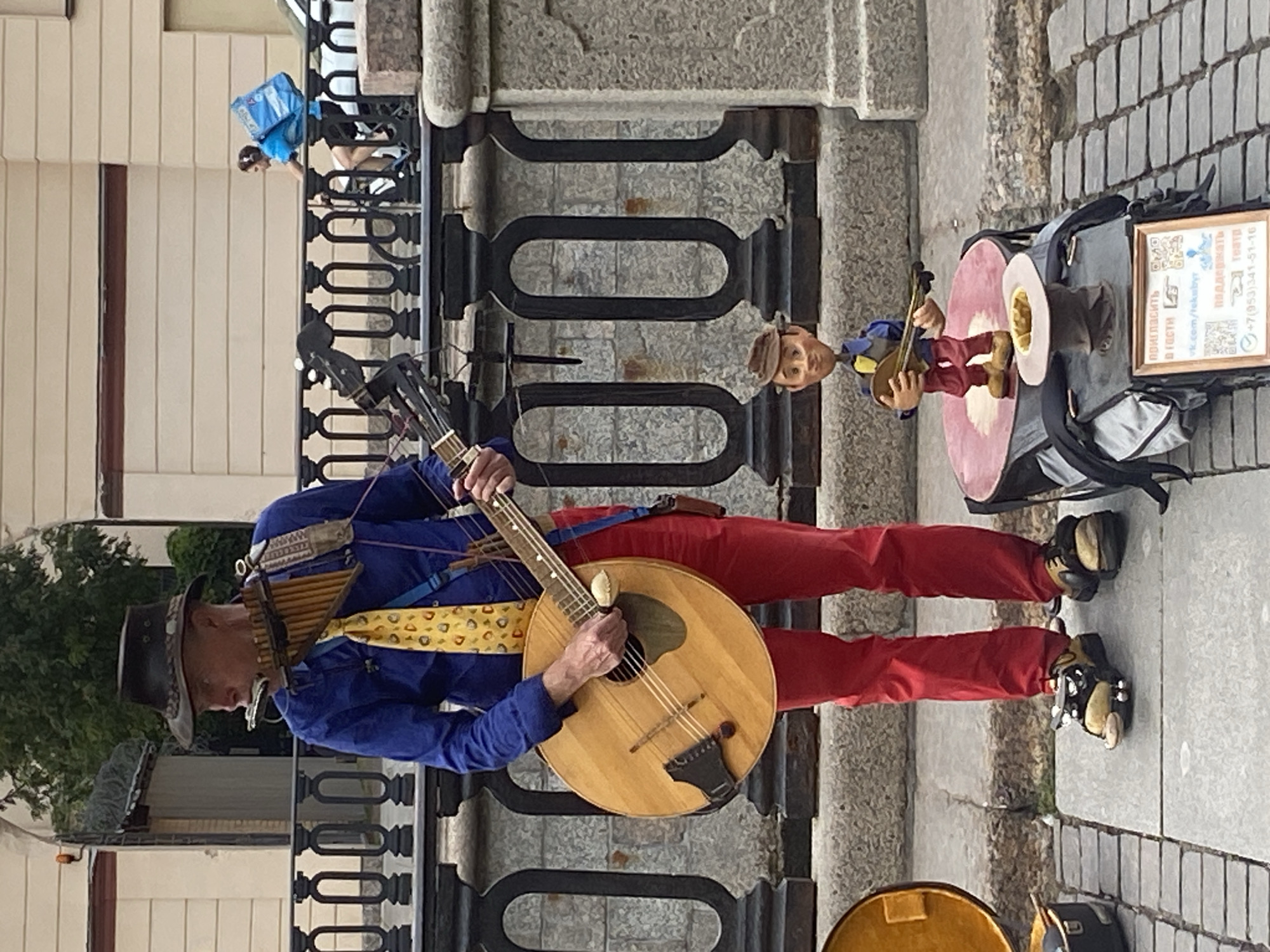Tourists and street performers gather near Spilled Blood Church