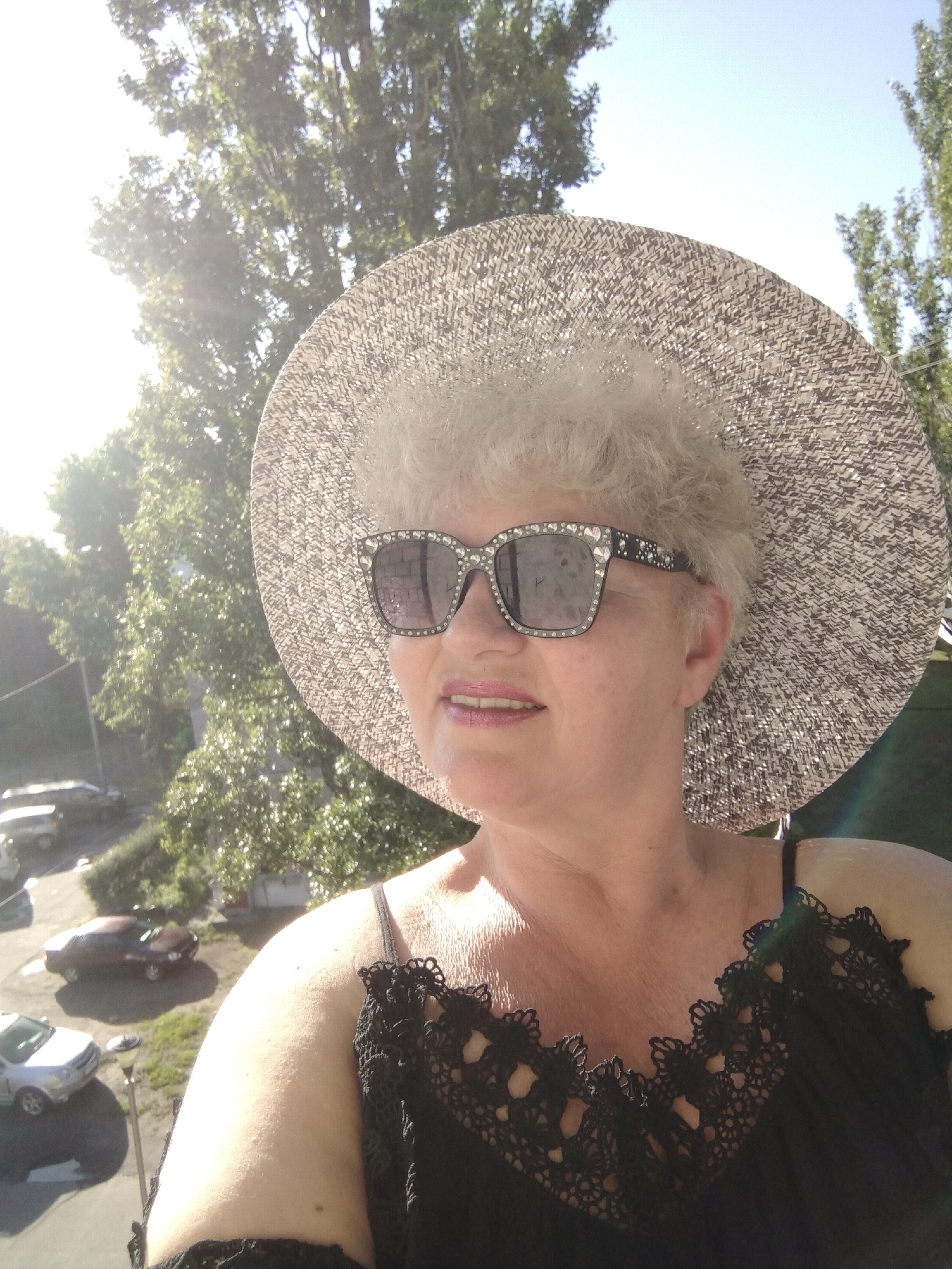 Woman documents sunny morning routine in Ukrainian garden
