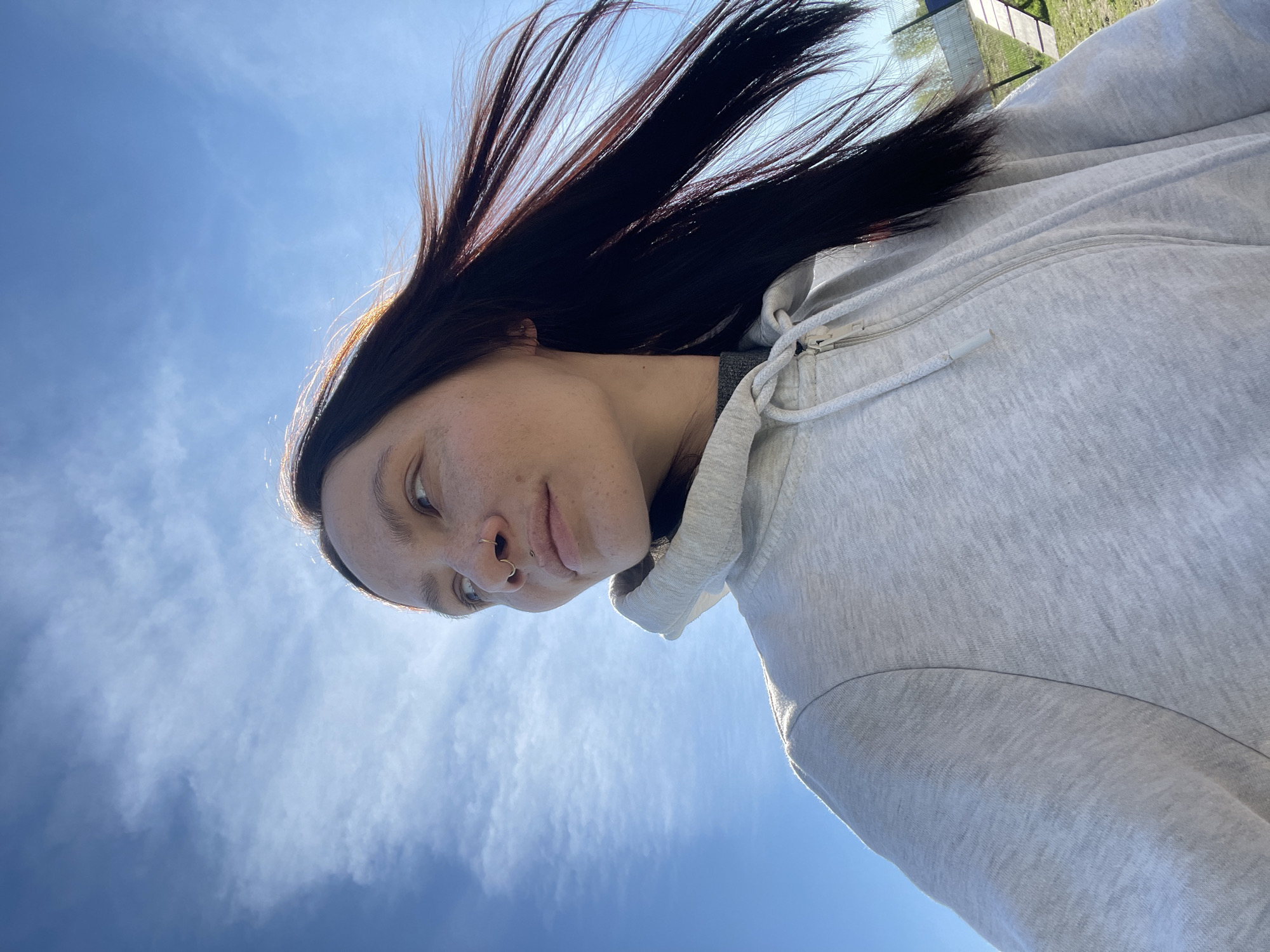 Person photographed against blue sky in Pervomaysky, Russia