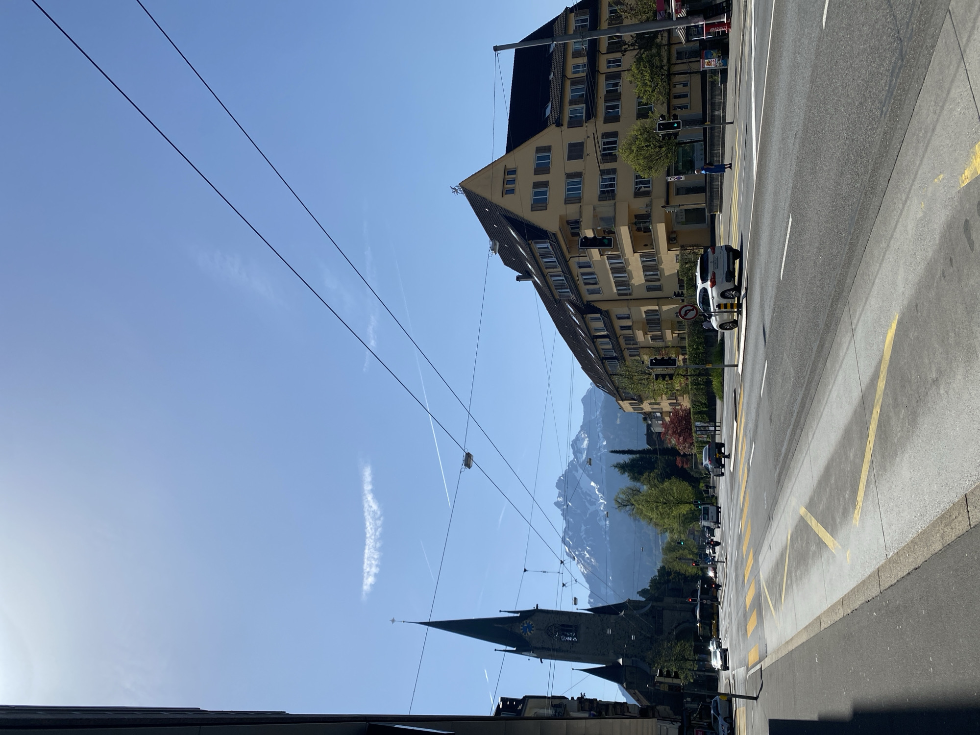 Street scene captured in Lucerne with mountain backdrop