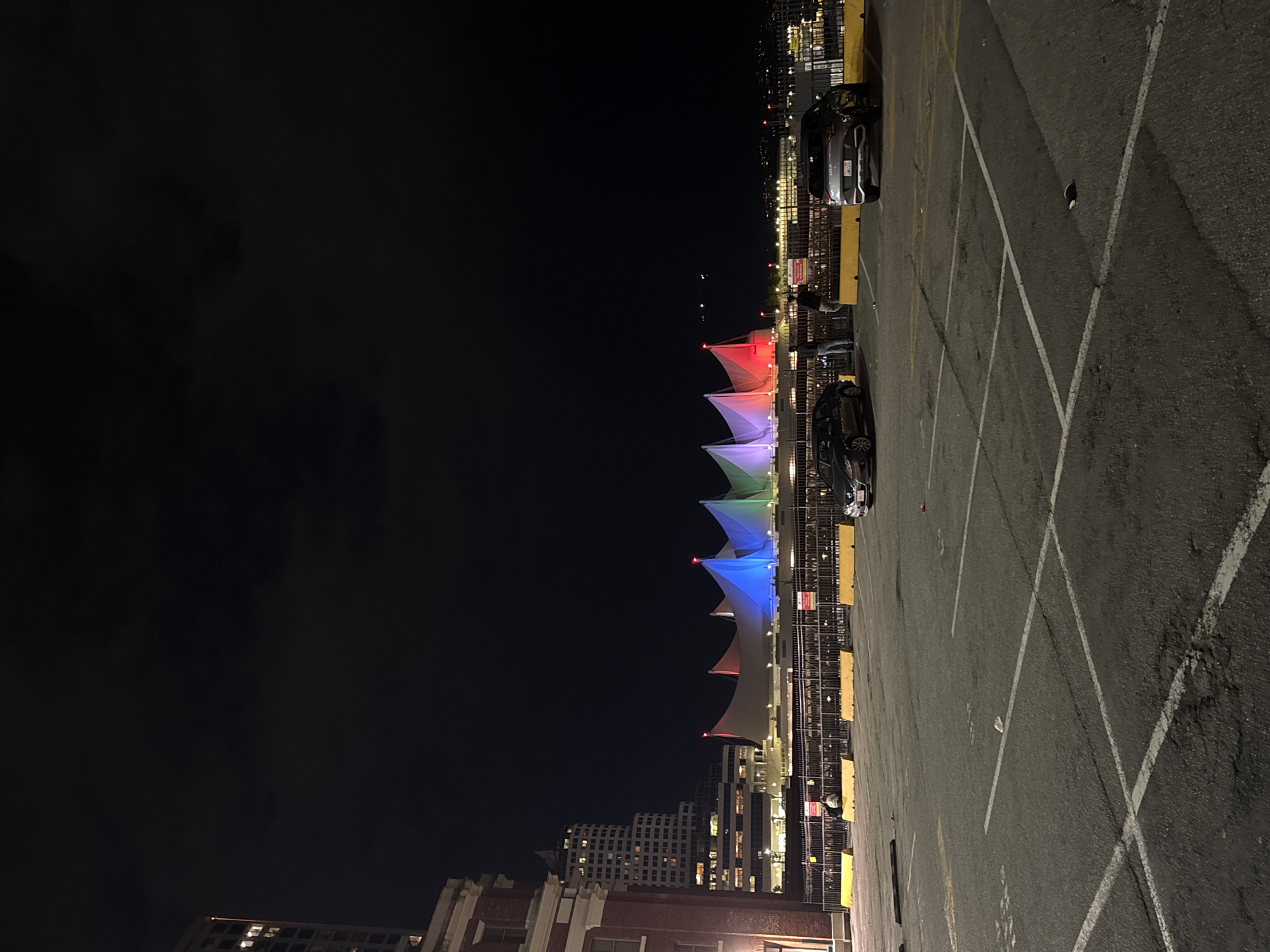 Nighttime walk documents Vancouver's illuminated downtown and active container port