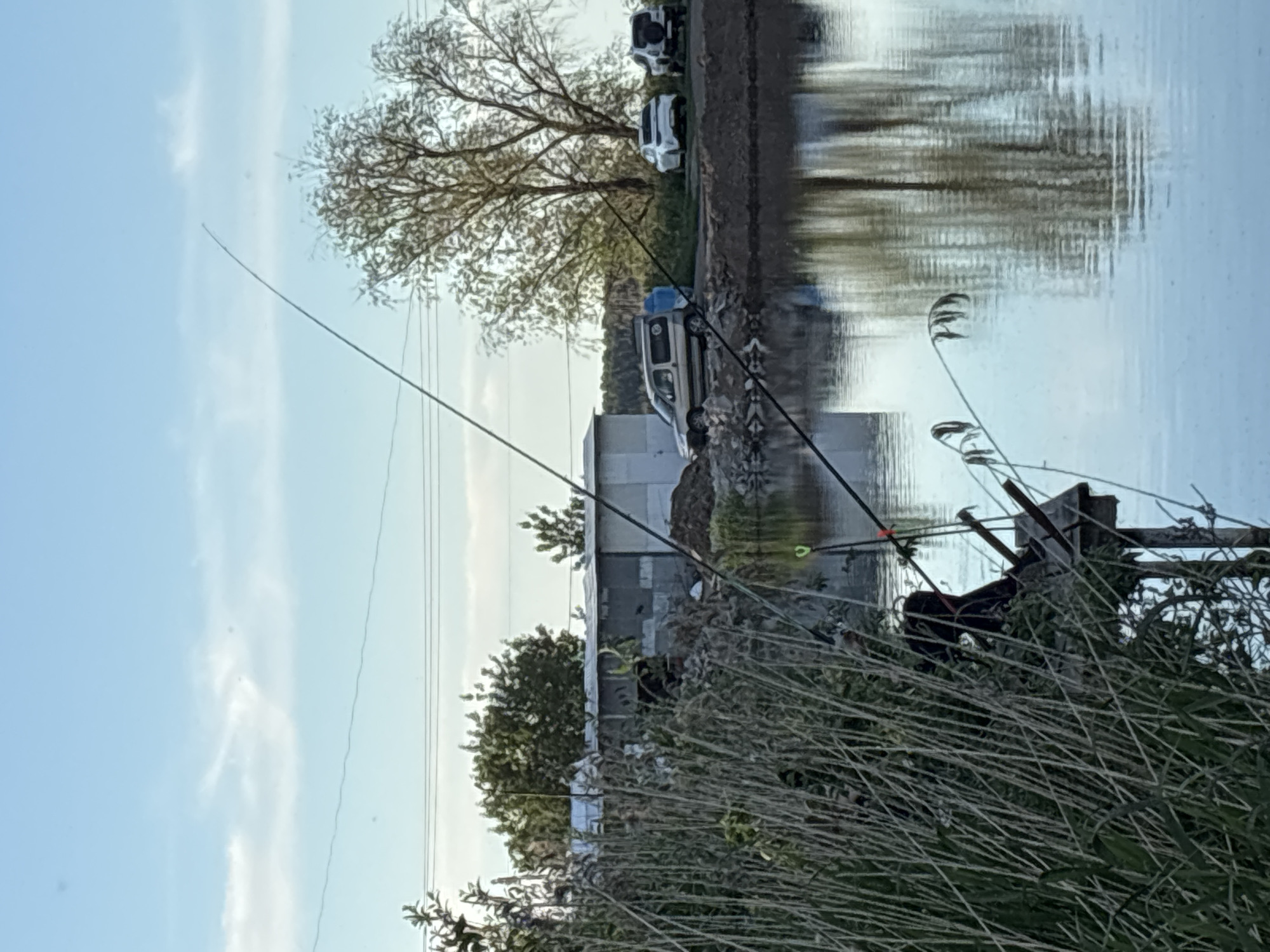Afternoon fishing session documented at Khryashchevka lake dock