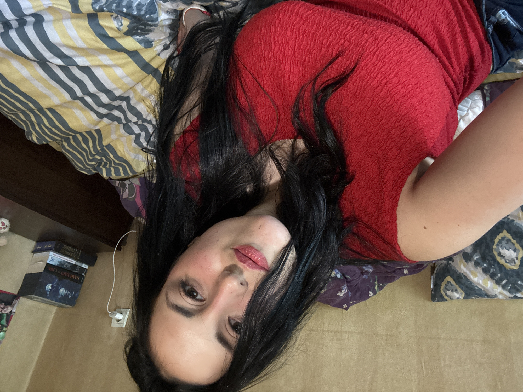 Woman photographs herself indoors in Varna, Bulgaria