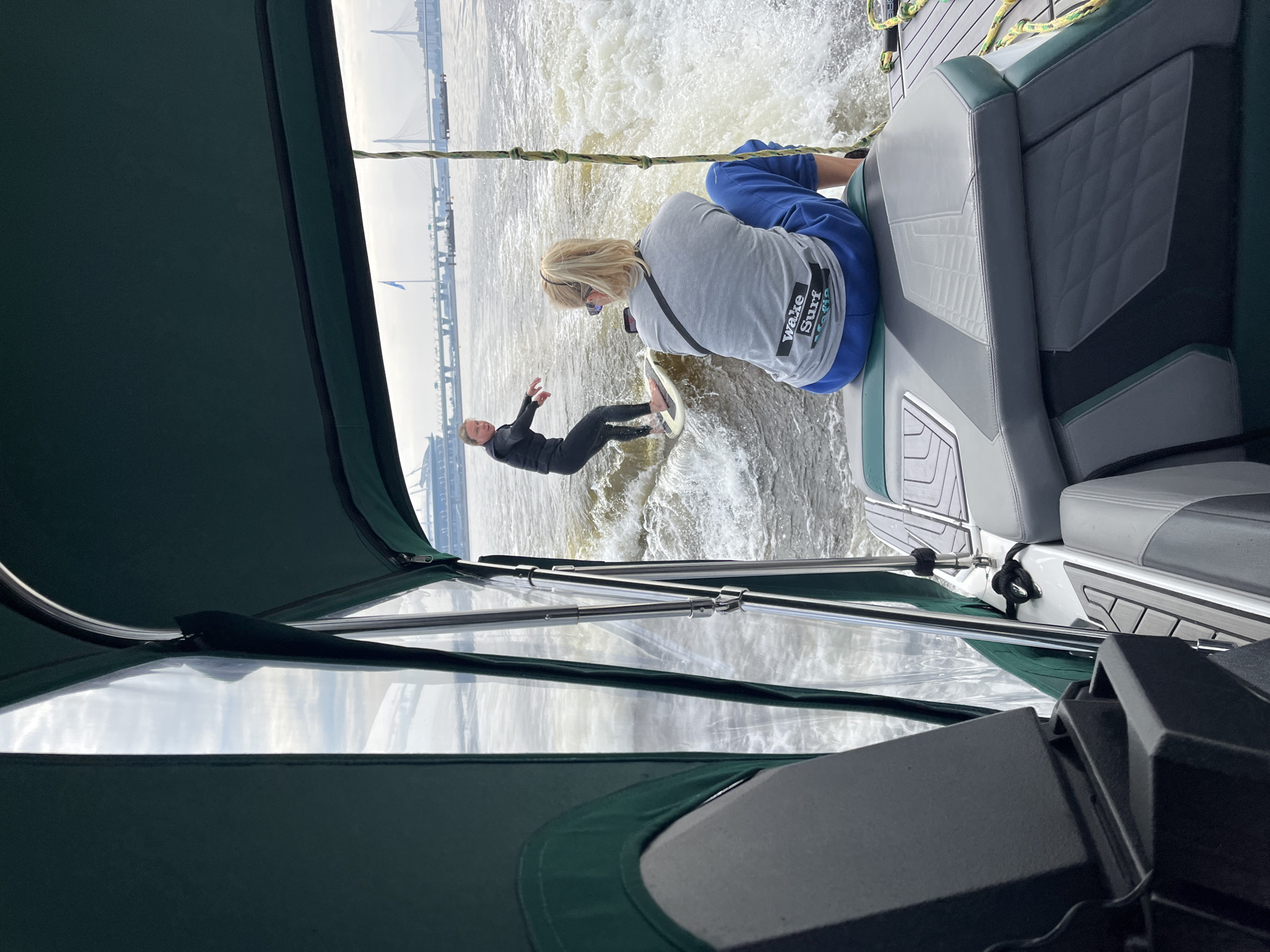 Wake surfing and skyline views on St. Petersburg's waterways