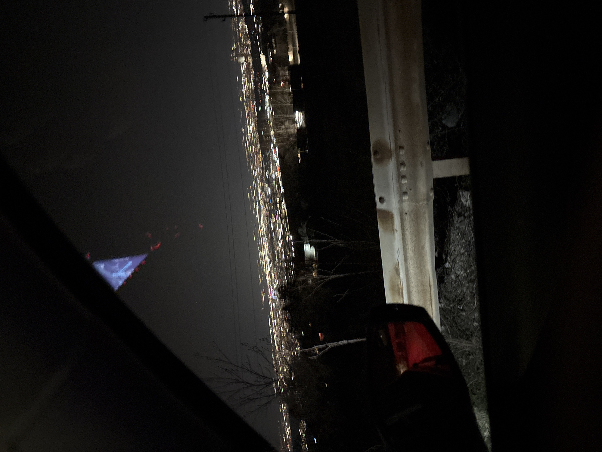 Nighttime Sofia cityscape observed from vehicle window