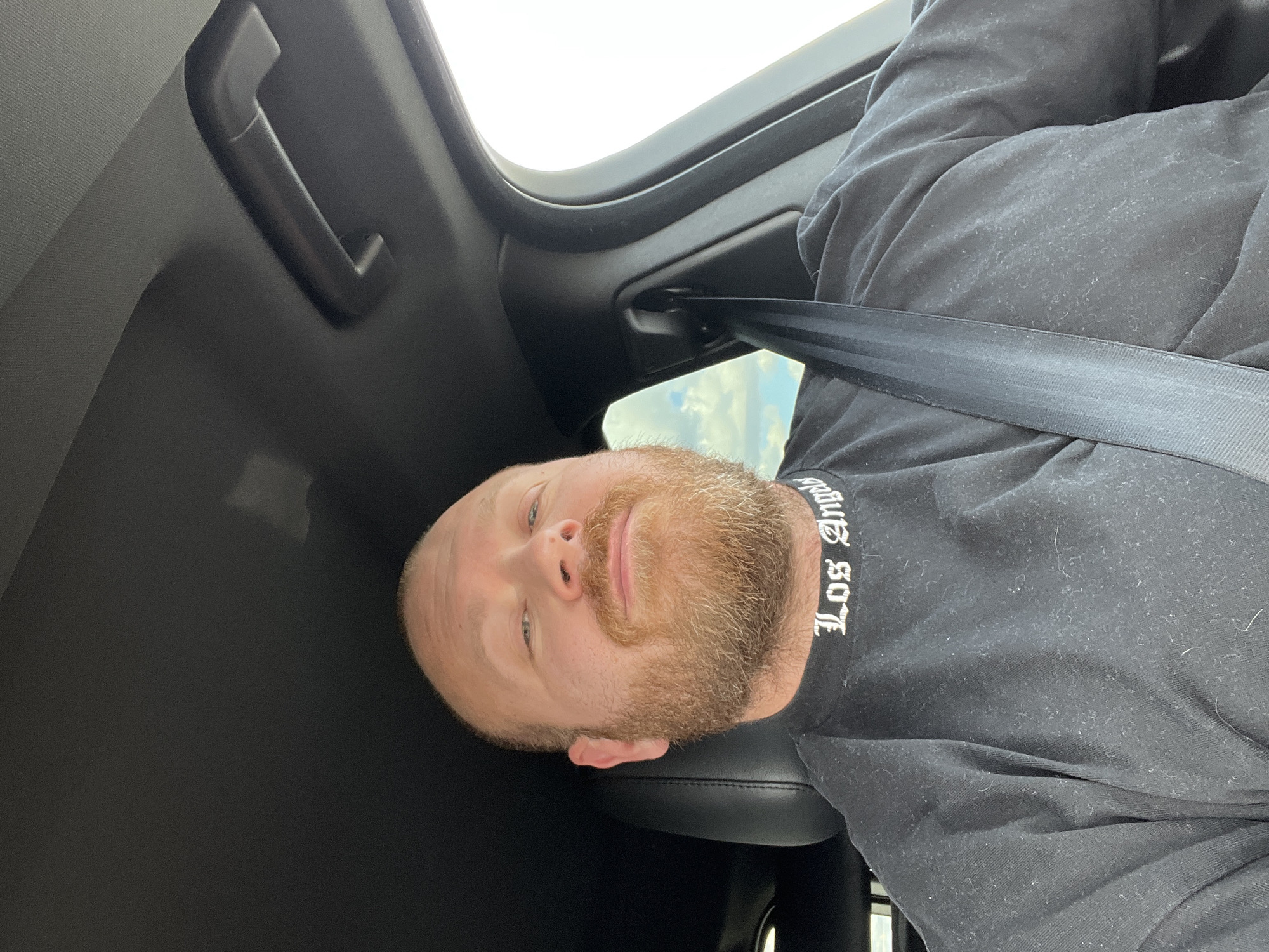 Man photographed in car in Chaikovsky, Russia