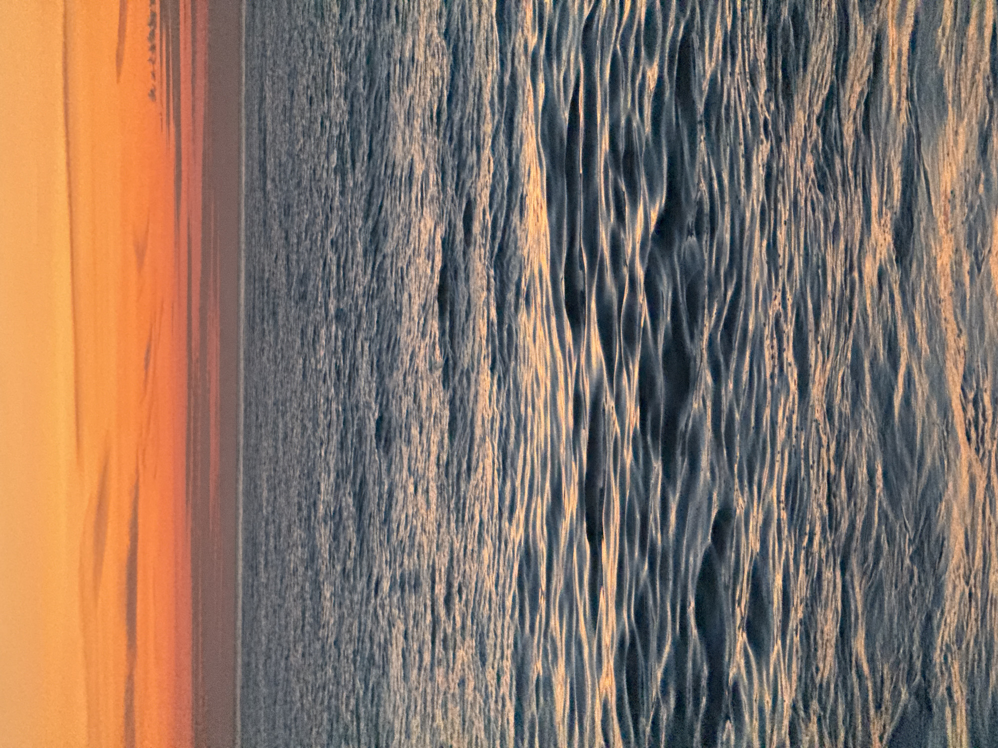 Sunset captured over Batumi coast, Georgia beach bathed orange